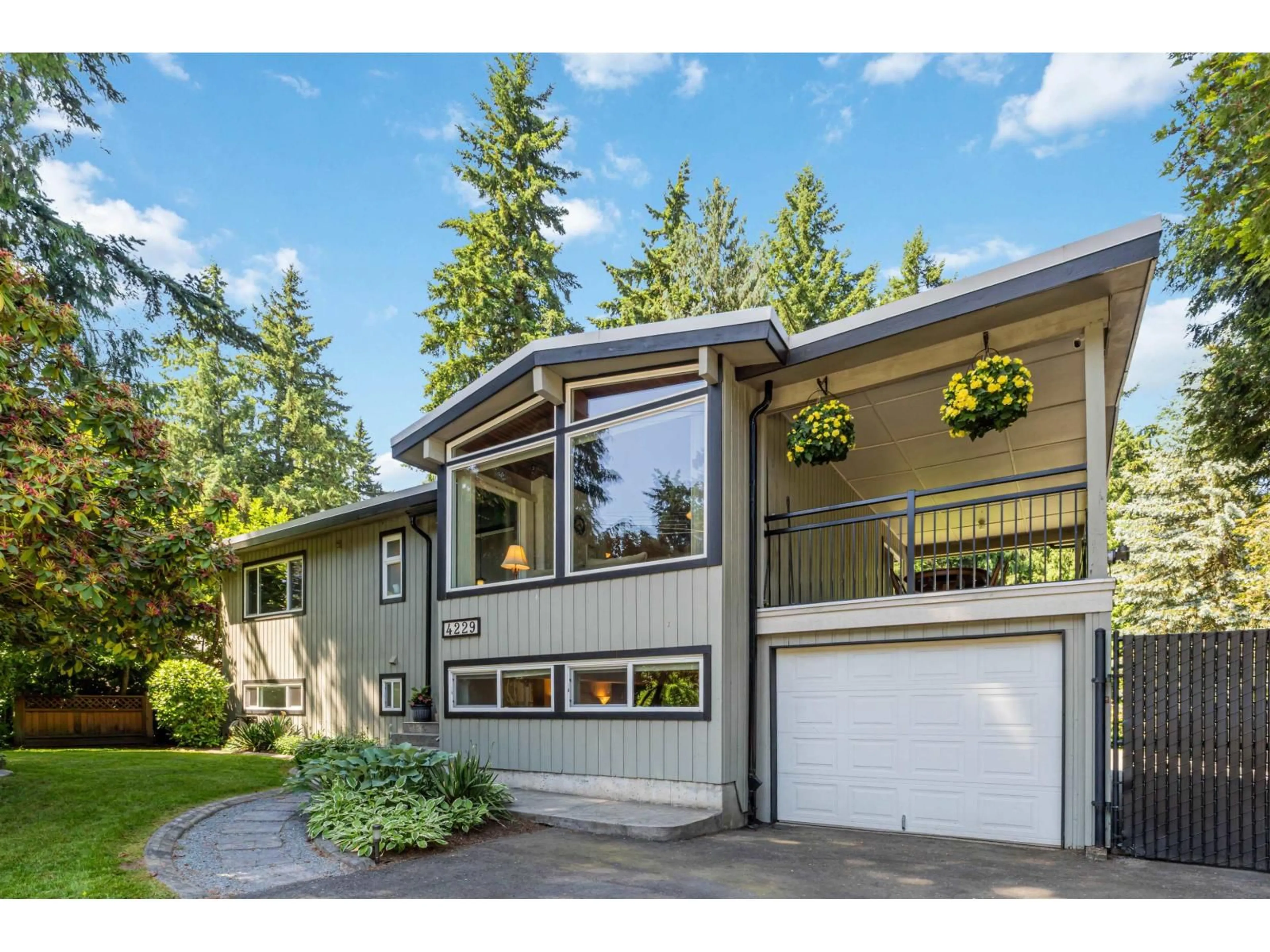 Home with vinyl exterior material, street for 4229 196B, Langley British Columbia V3A1A9