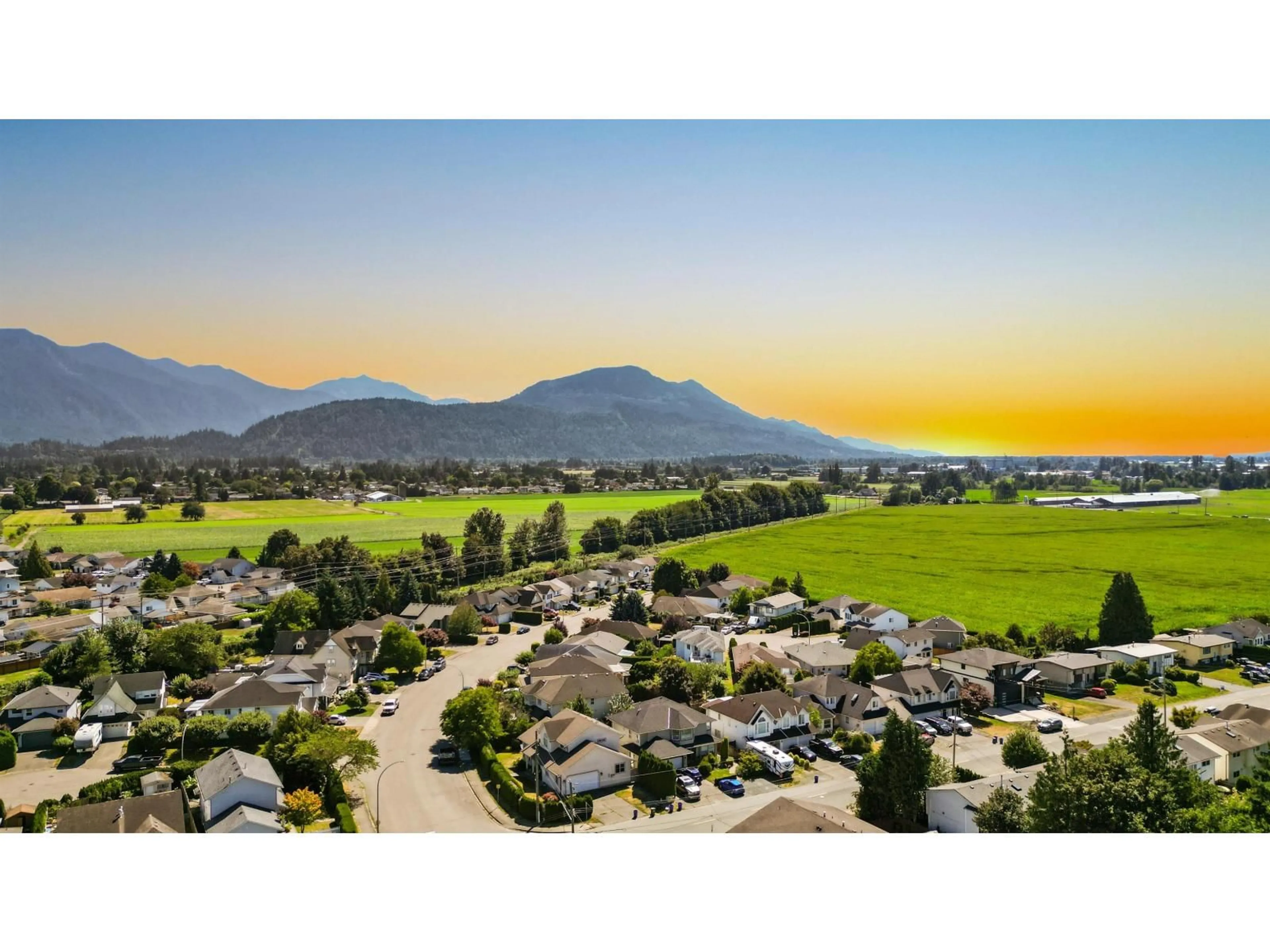 A pic from outside/outdoor area/front of a property/back of a property/a pic from drone, mountain view for 7147 ELWOOD DRIVE, Chilliwack British Columbia V2R1G8