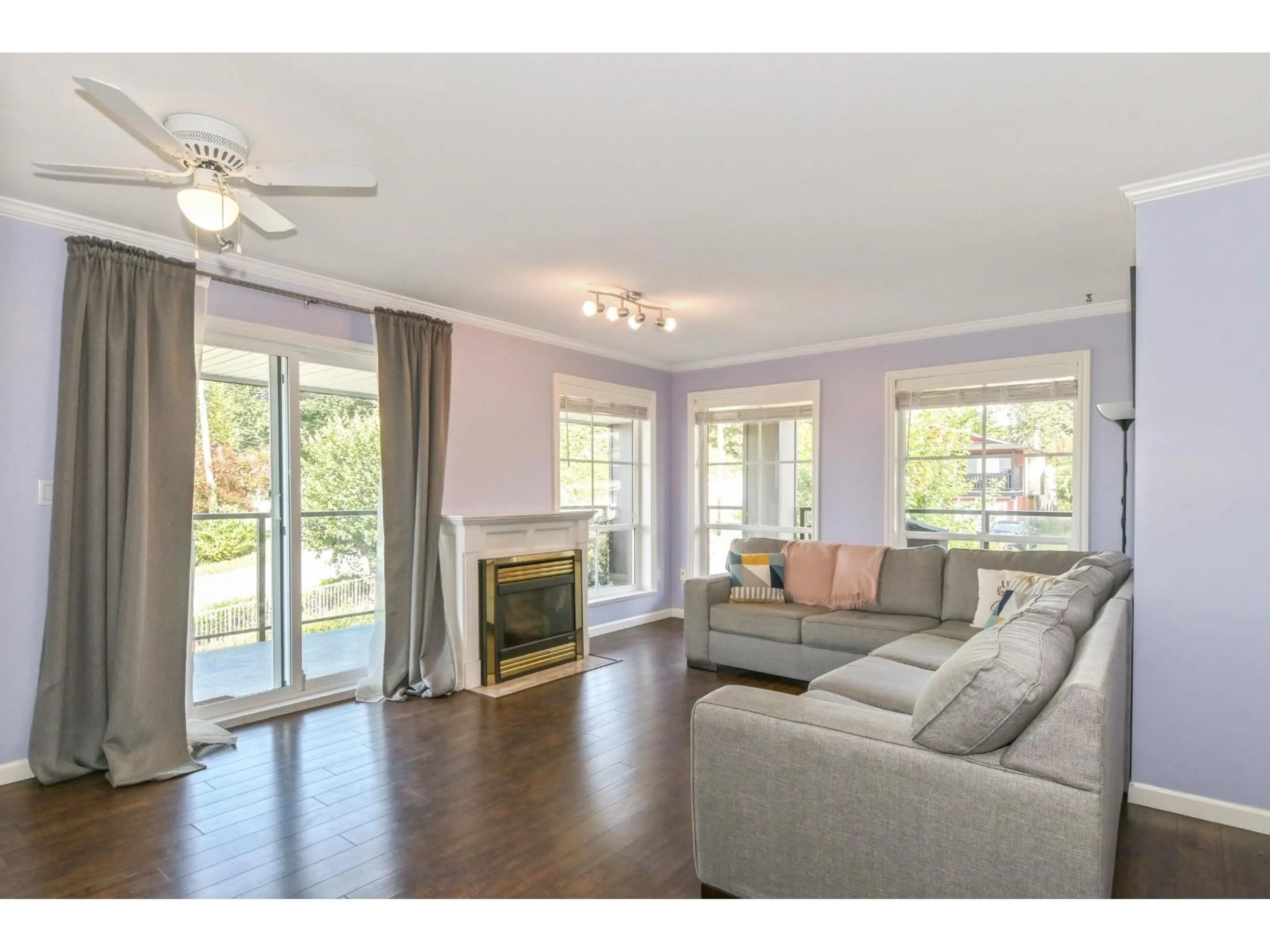 Living room with furniture, wood/laminate floor for 213 - 33150 4, Mission British Columbia V2V7A3