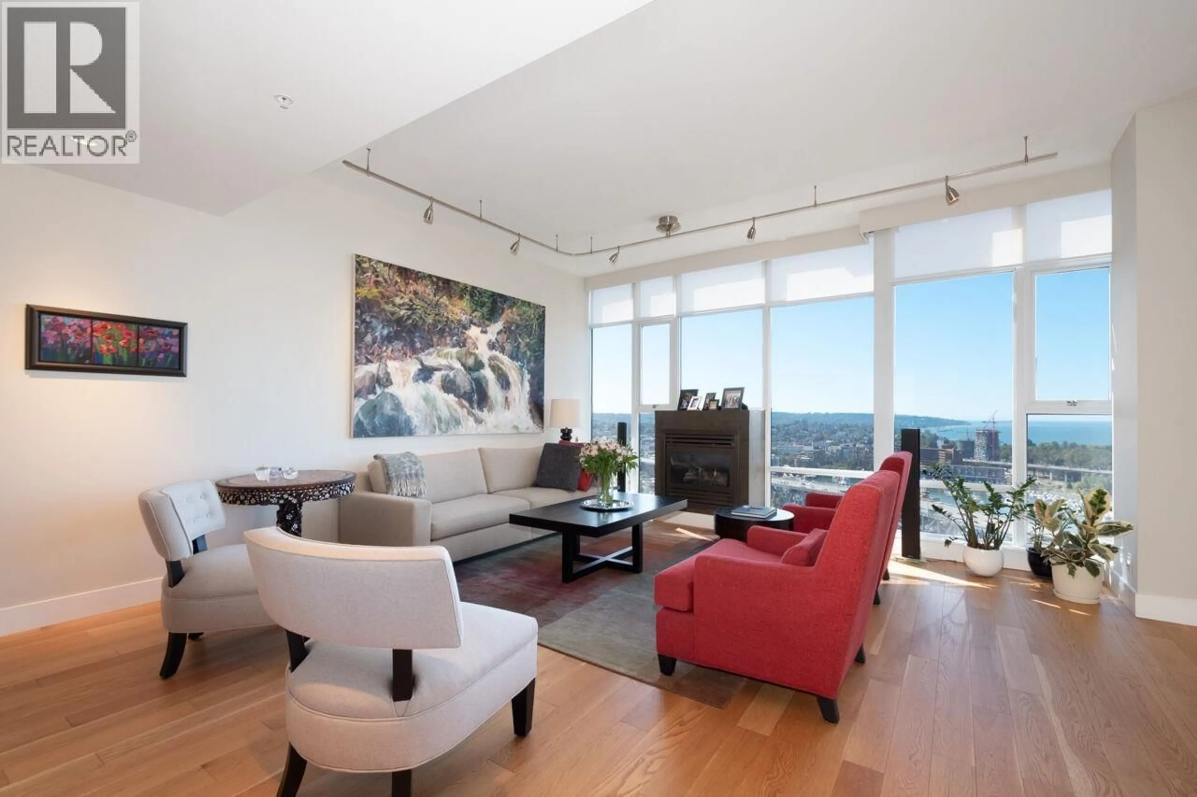 Living room with furniture, wood/laminate floor for 3503 - 455 BEACH CRESCENT, Vancouver British Columbia V6Z3E5