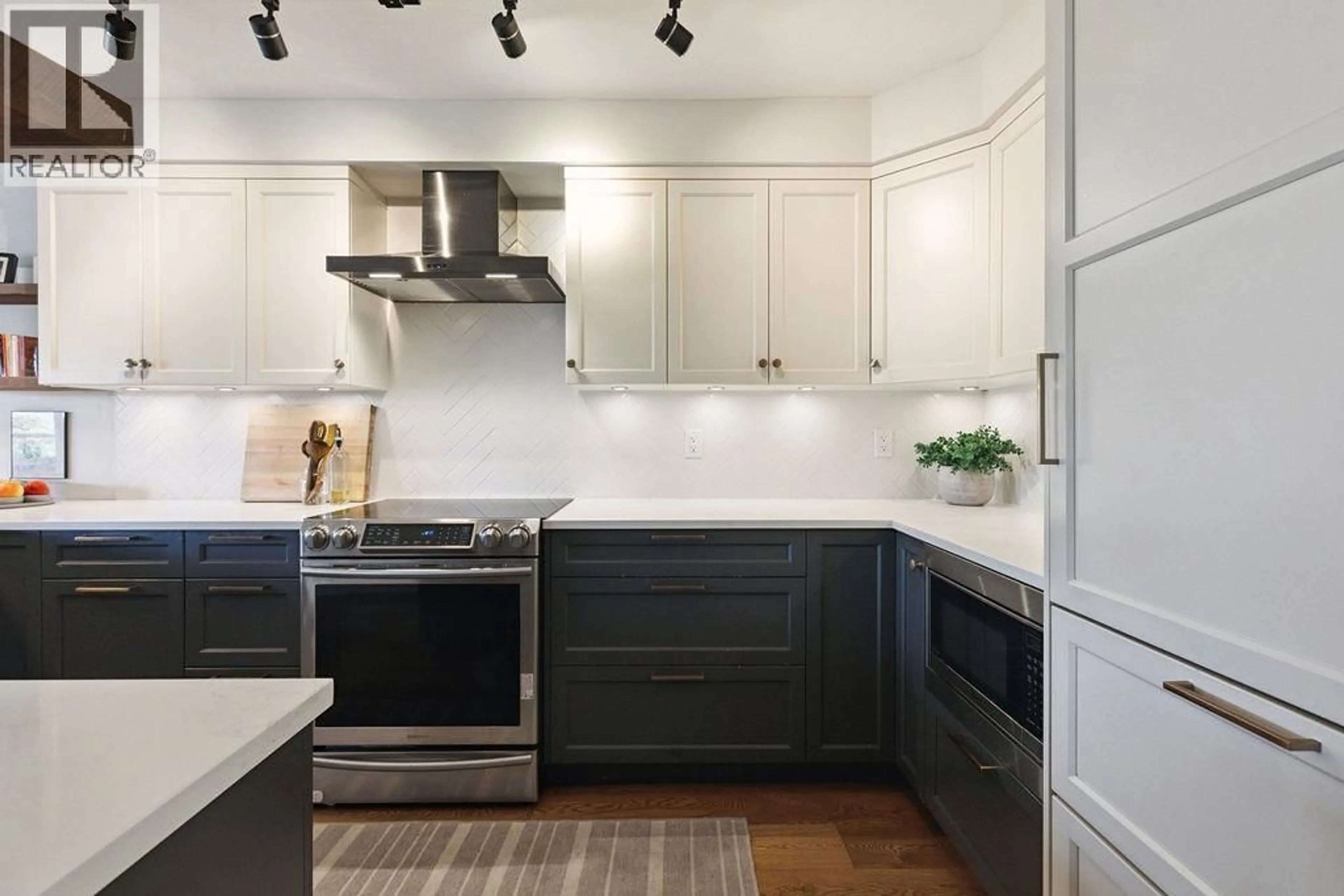 Contemporary kitchen, ceramic/tile floor for 215 - 3250 BROADWAY STREET, Vancouver British Columbia V6K2H4