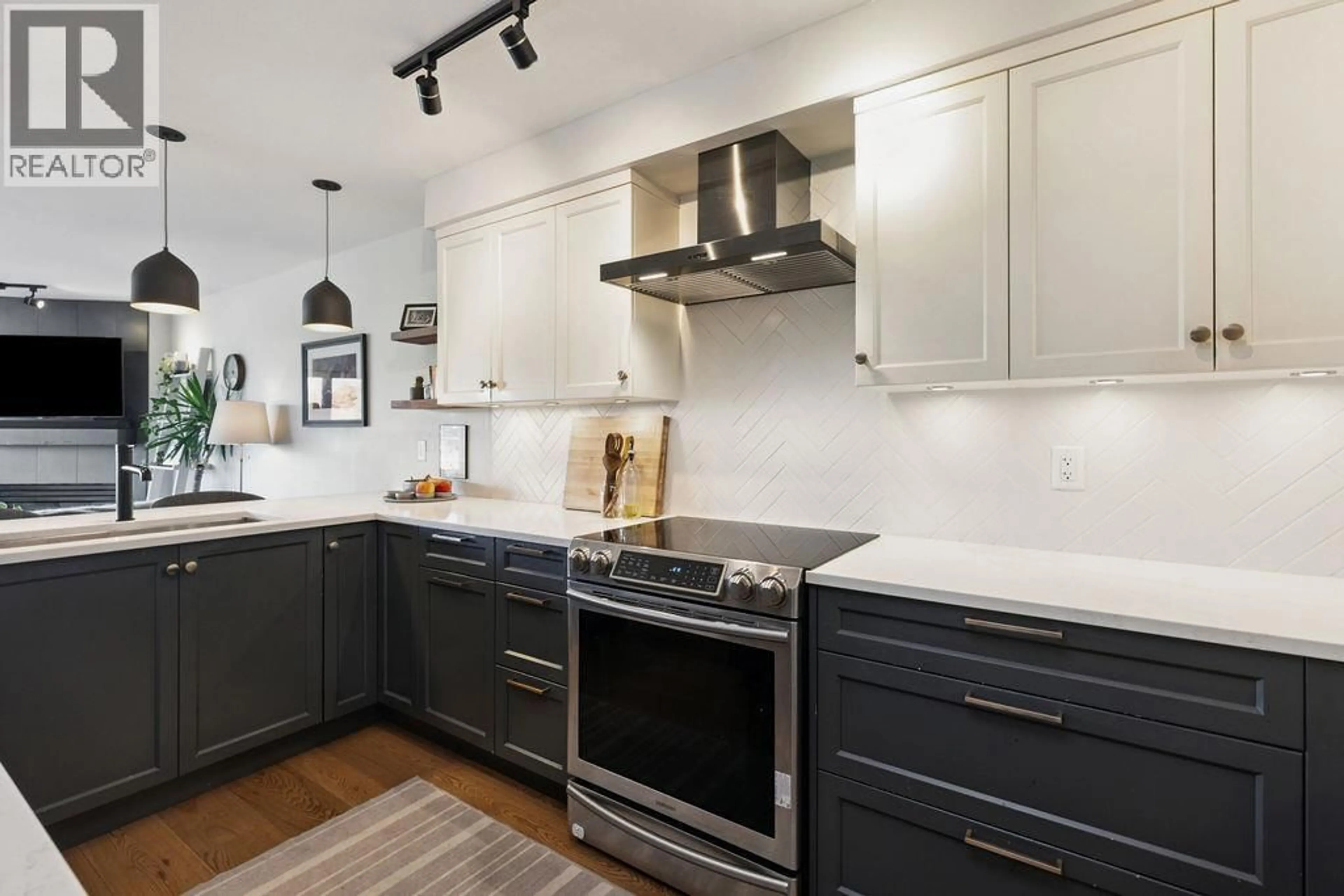 Contemporary kitchen, unknown for 215 - 3250 BROADWAY STREET, Vancouver British Columbia V6K2H4