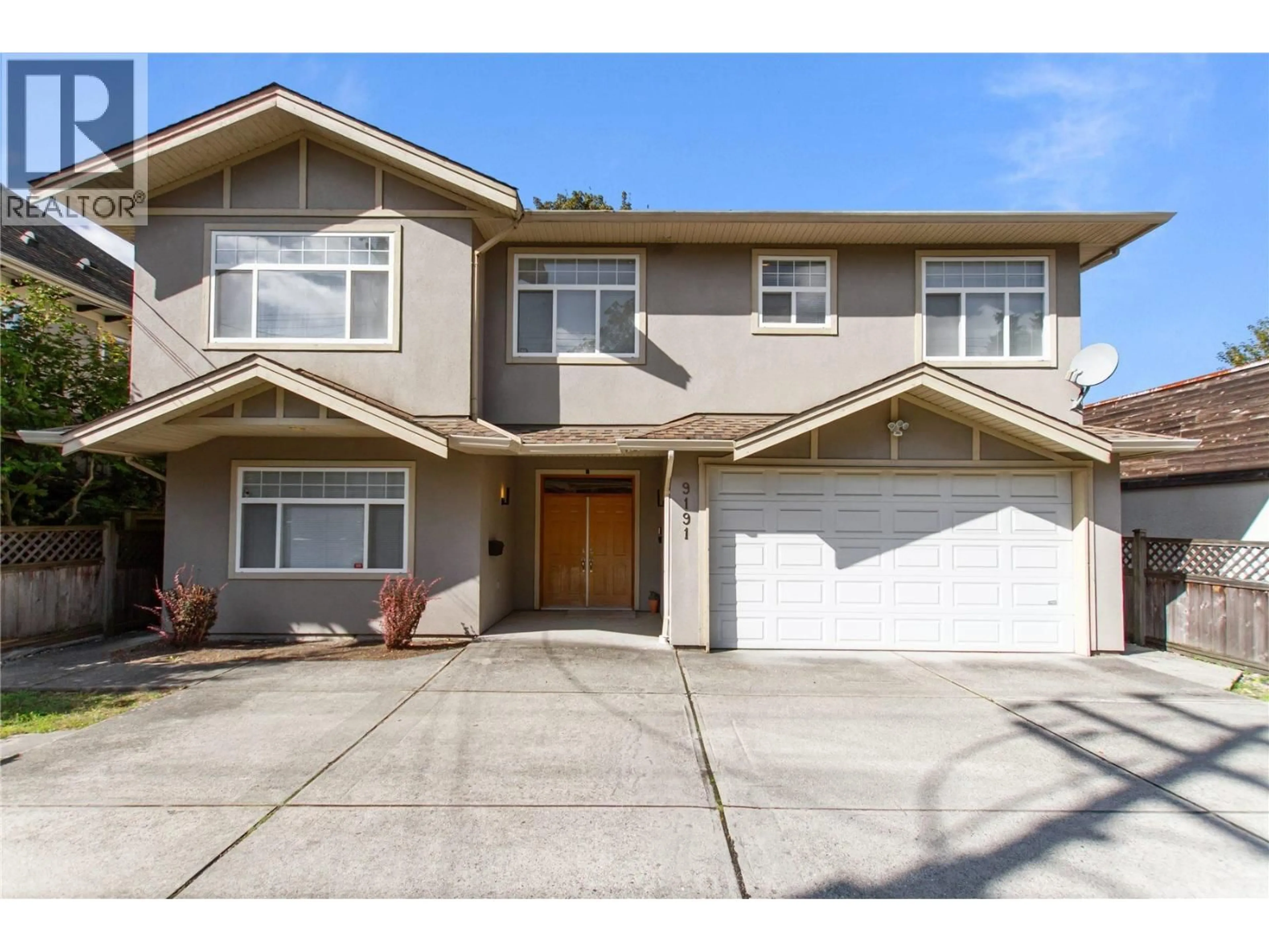 Home with vinyl exterior material, street for 9191 NO. 2 ROAD, Richmond British Columbia V7E2C9