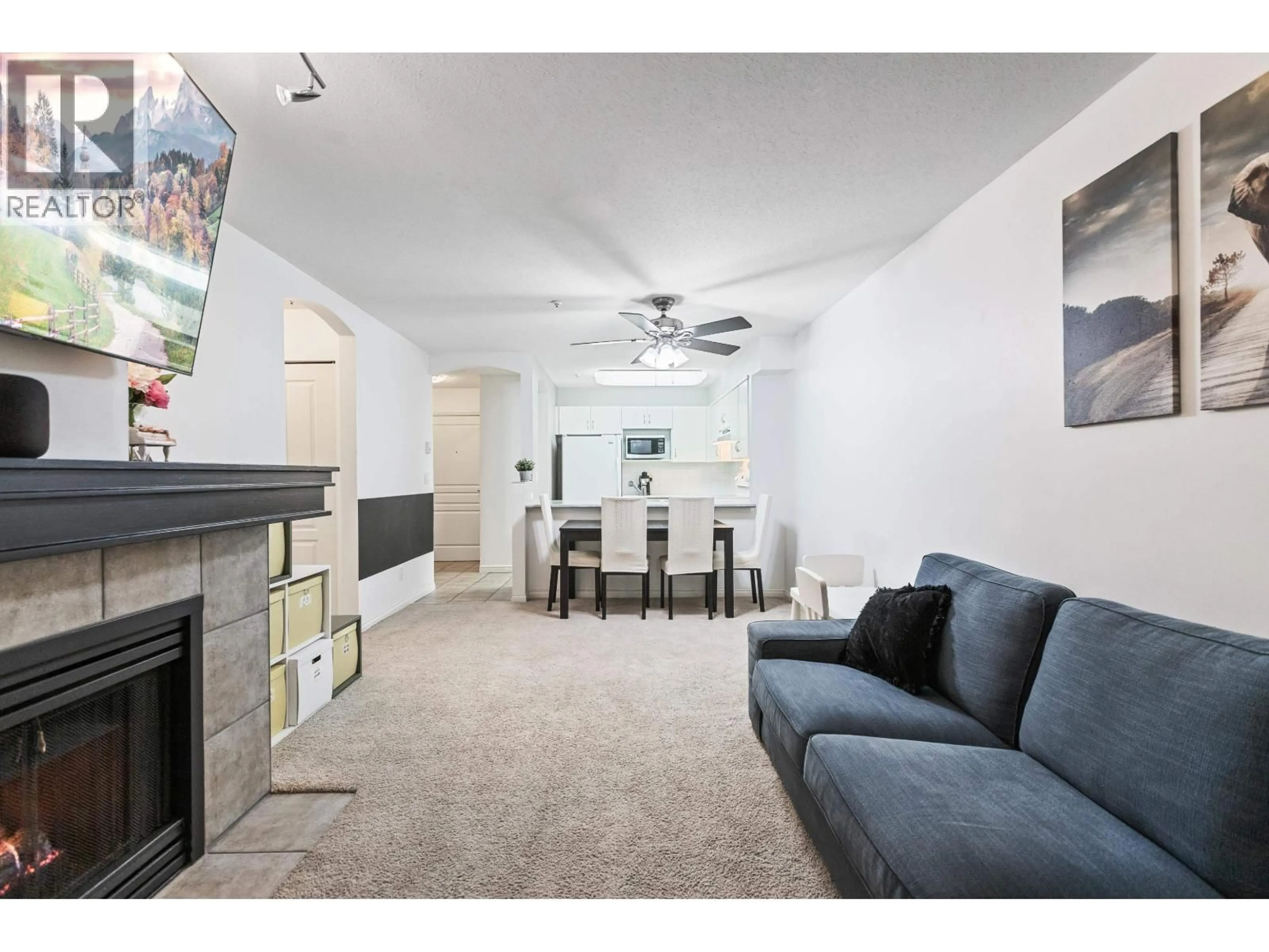 Living room with furniture, unknown for 107 - 3033 TERRAVISTA PLACE, Port Moody British Columbia V3H5A3