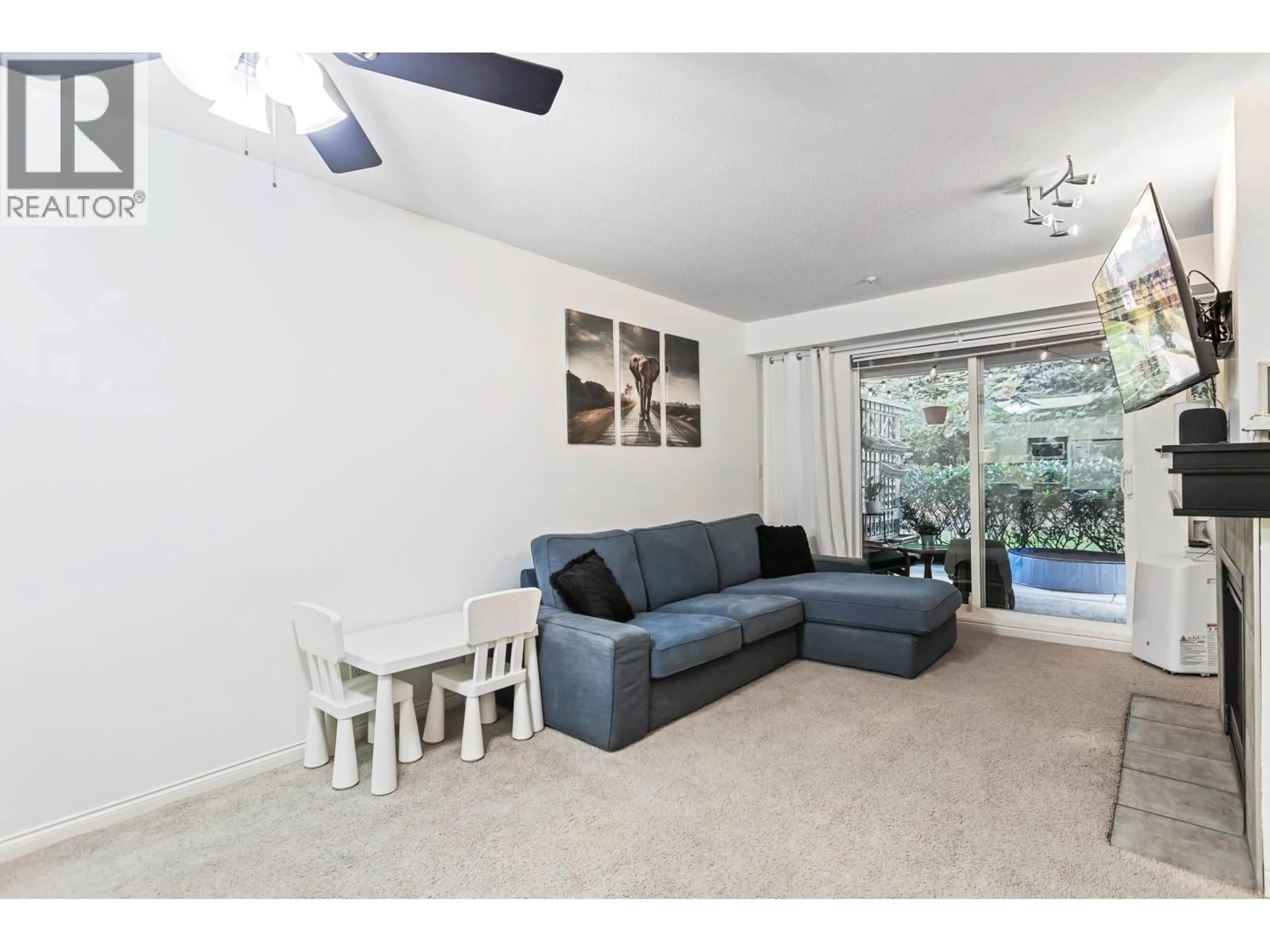 Living room with furniture, unknown for 107 - 3033 TERRAVISTA PLACE, Port Moody British Columbia V3H5A3
