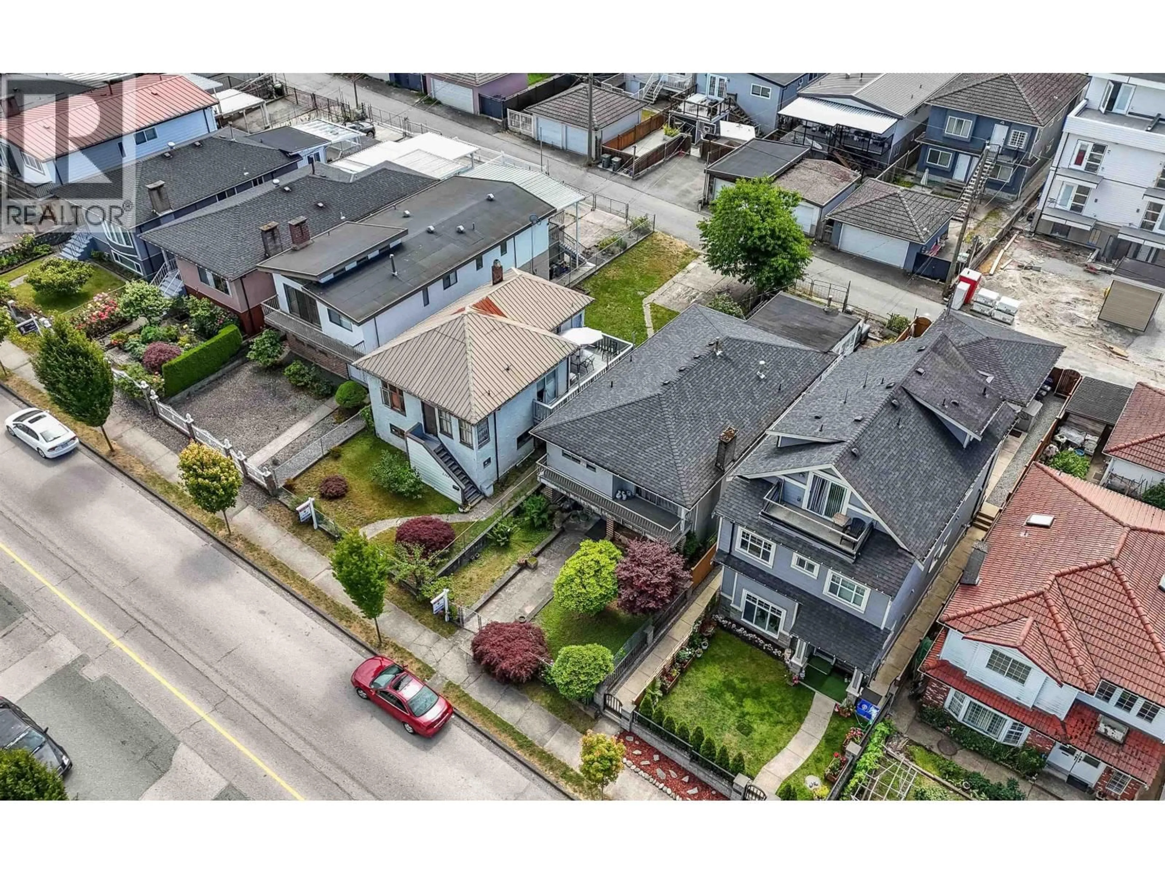 A pic from outside/outdoor area/front of a property/back of a property/a pic from drone, street for 2346 33RD AVENUE, Vancouver British Columbia V5R2S3