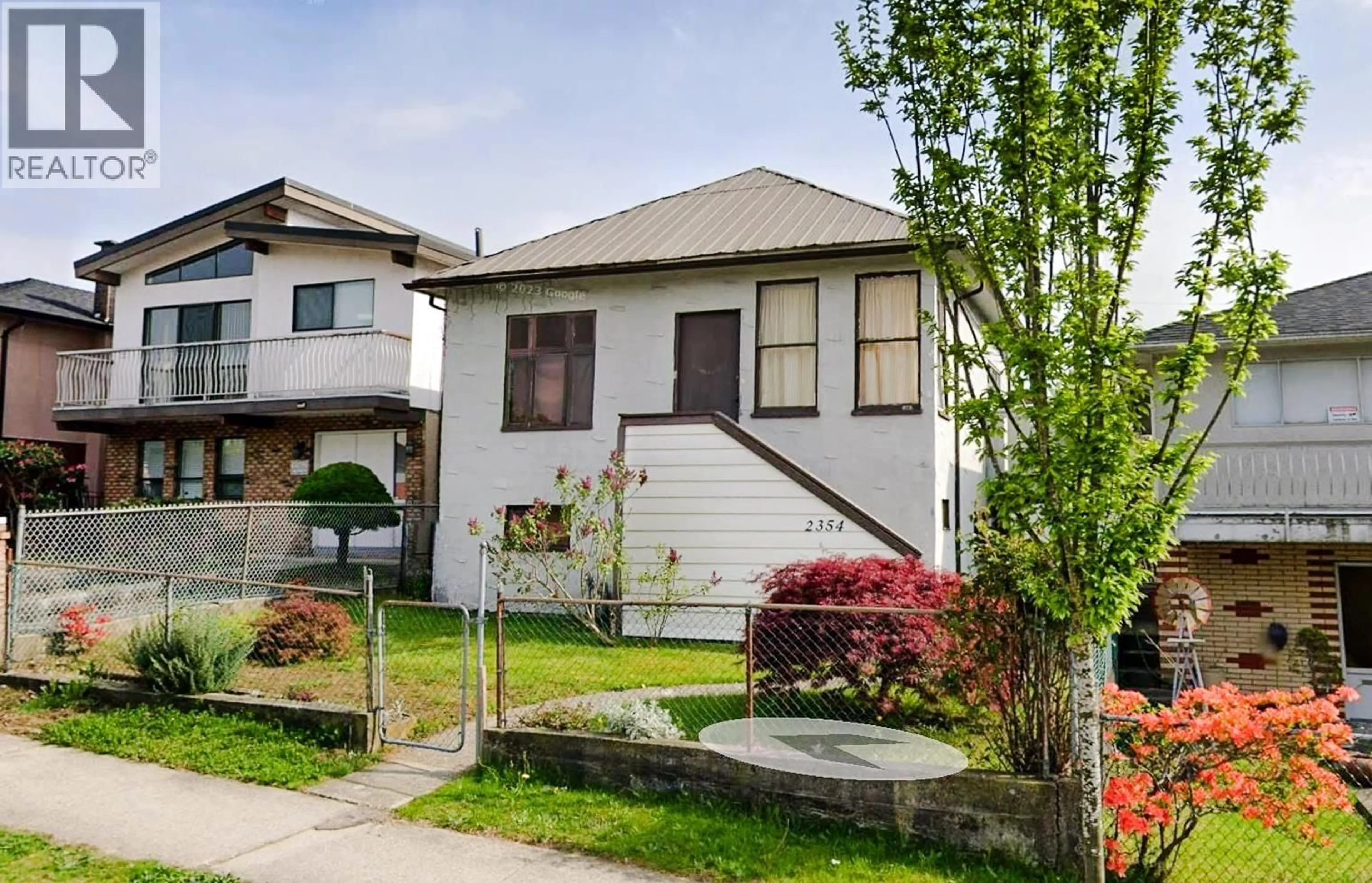 Home with vinyl exterior material, street for 2354 33RD AVENUE, Vancouver British Columbia V5R2S3