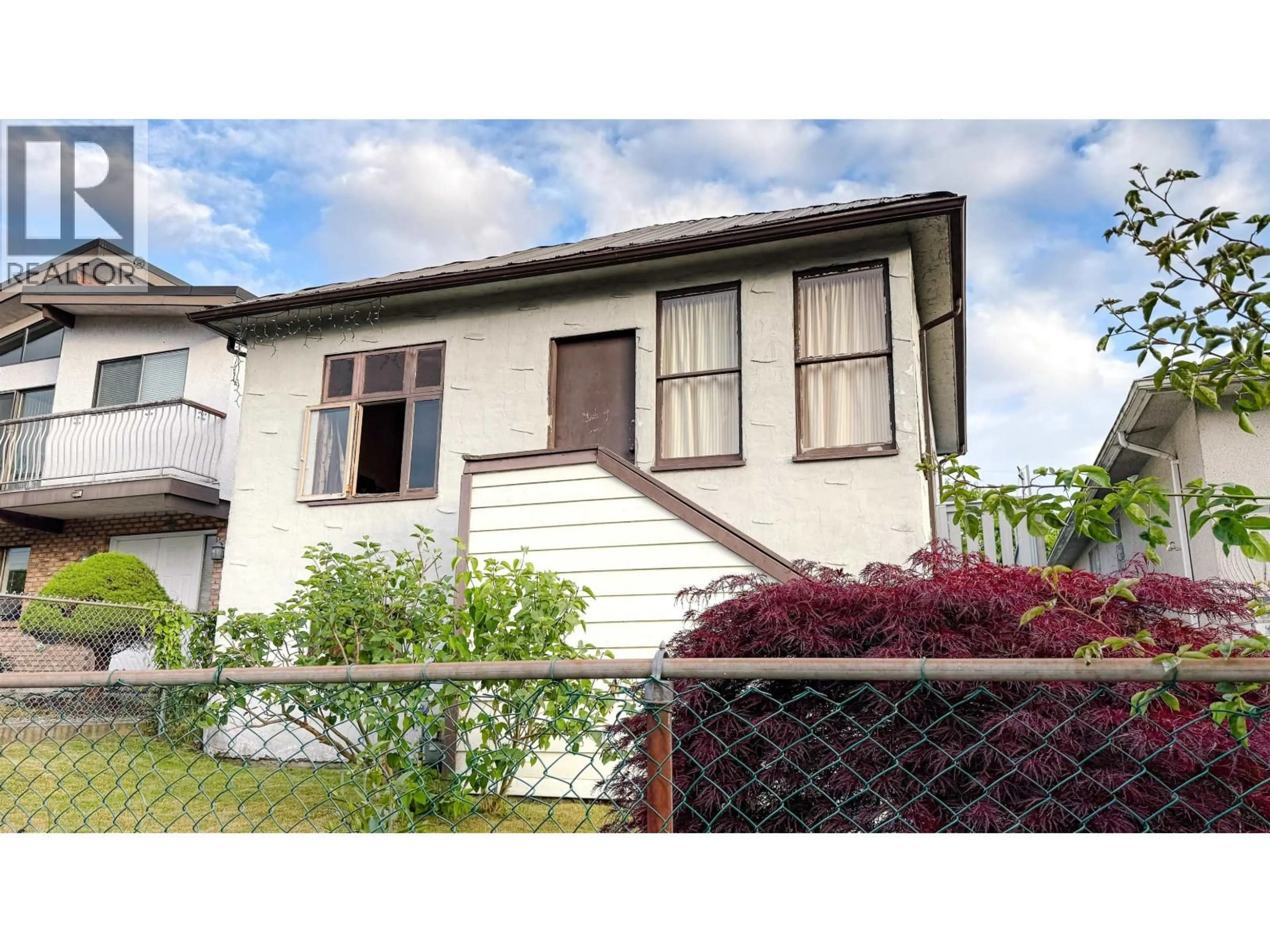 Home with vinyl exterior material, street for 2354 33RD AVENUE, Vancouver British Columbia V5R2S3