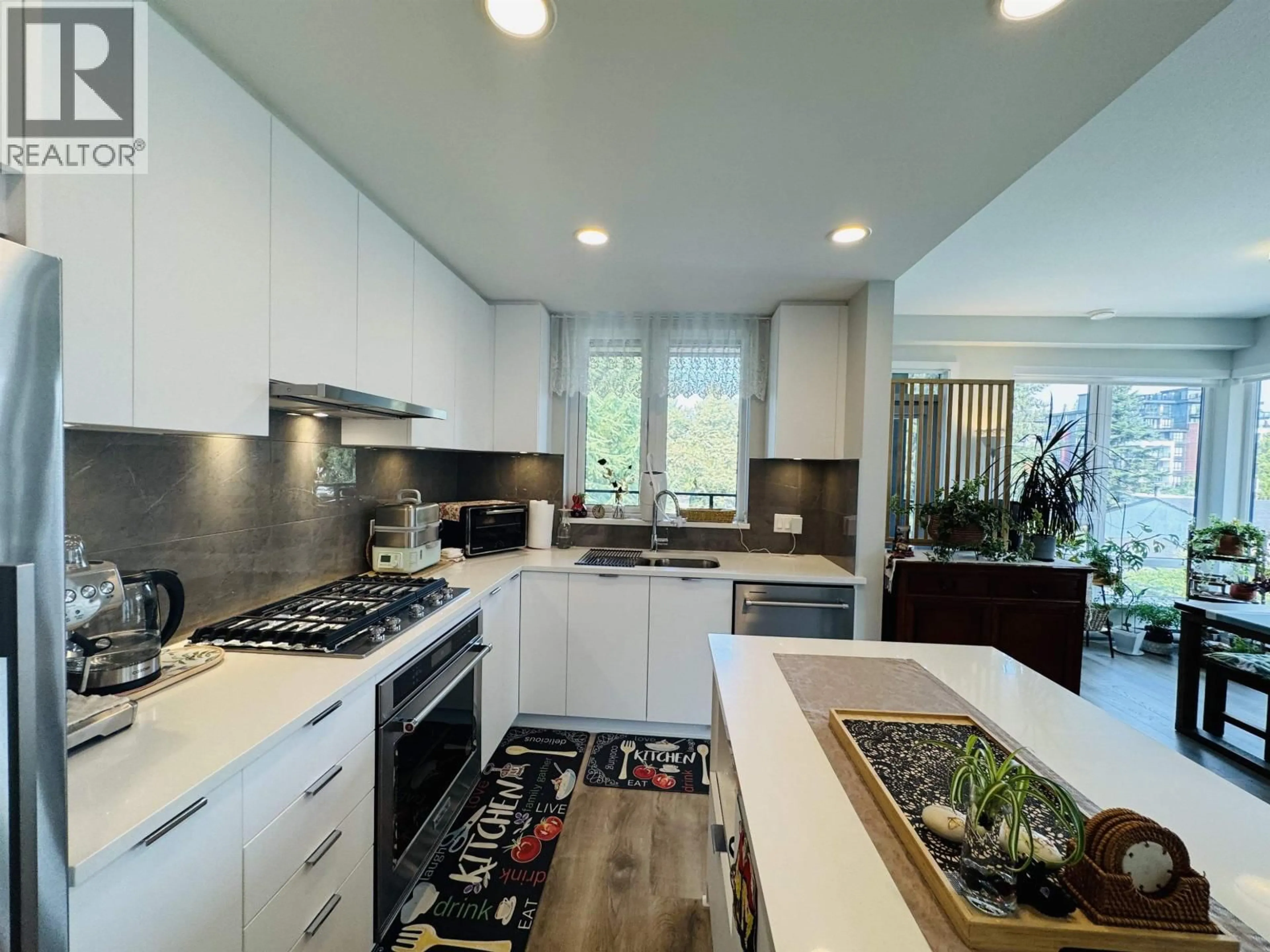 Contemporary kitchen, ceramic/tile floor for 506 - 615 COTTONWOOD AVENUE, Coquitlam British Columbia V3J2S5