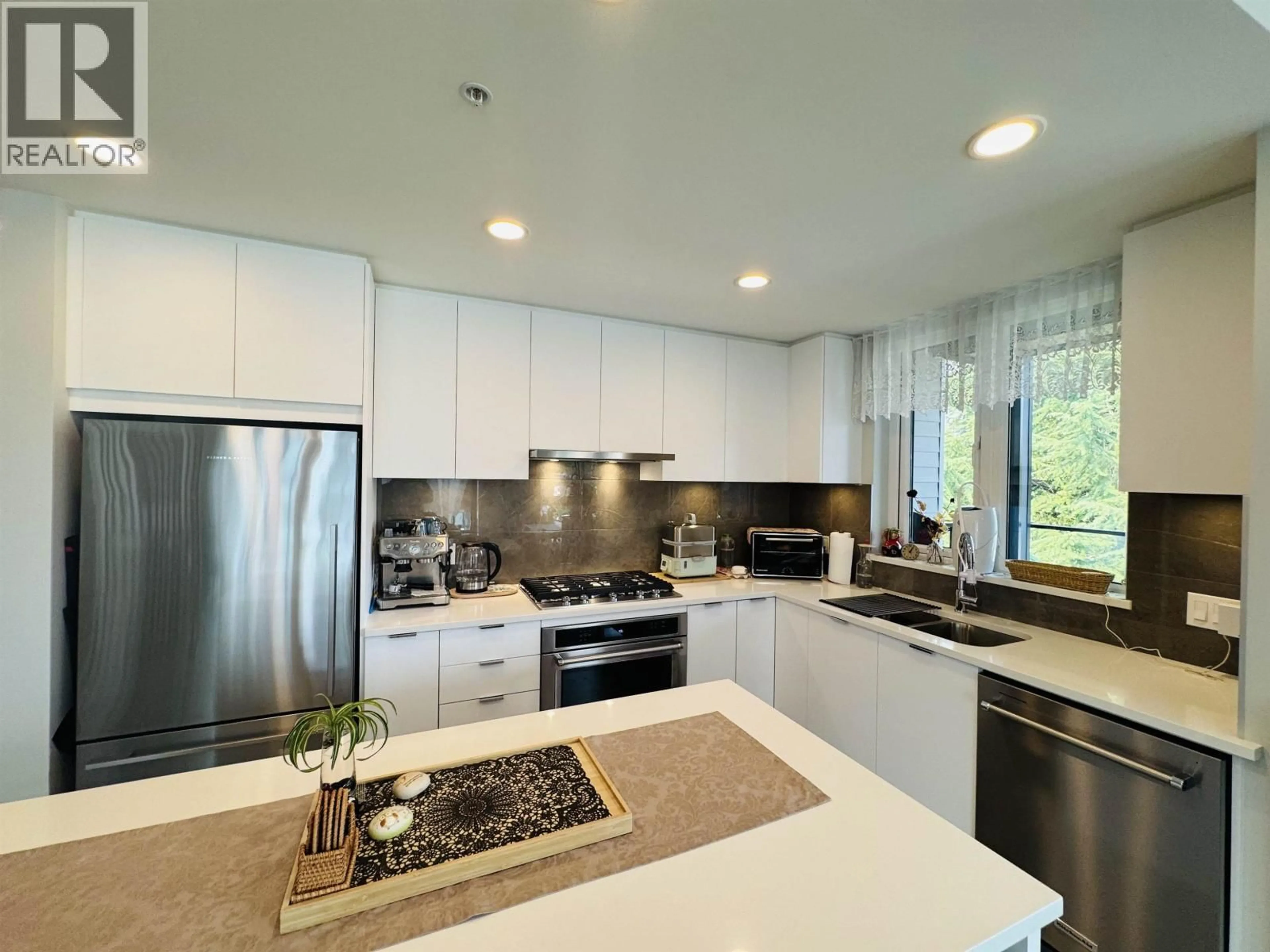 Contemporary kitchen, ceramic/tile floor for 506 - 615 COTTONWOOD AVENUE, Coquitlam British Columbia V3J2S5
