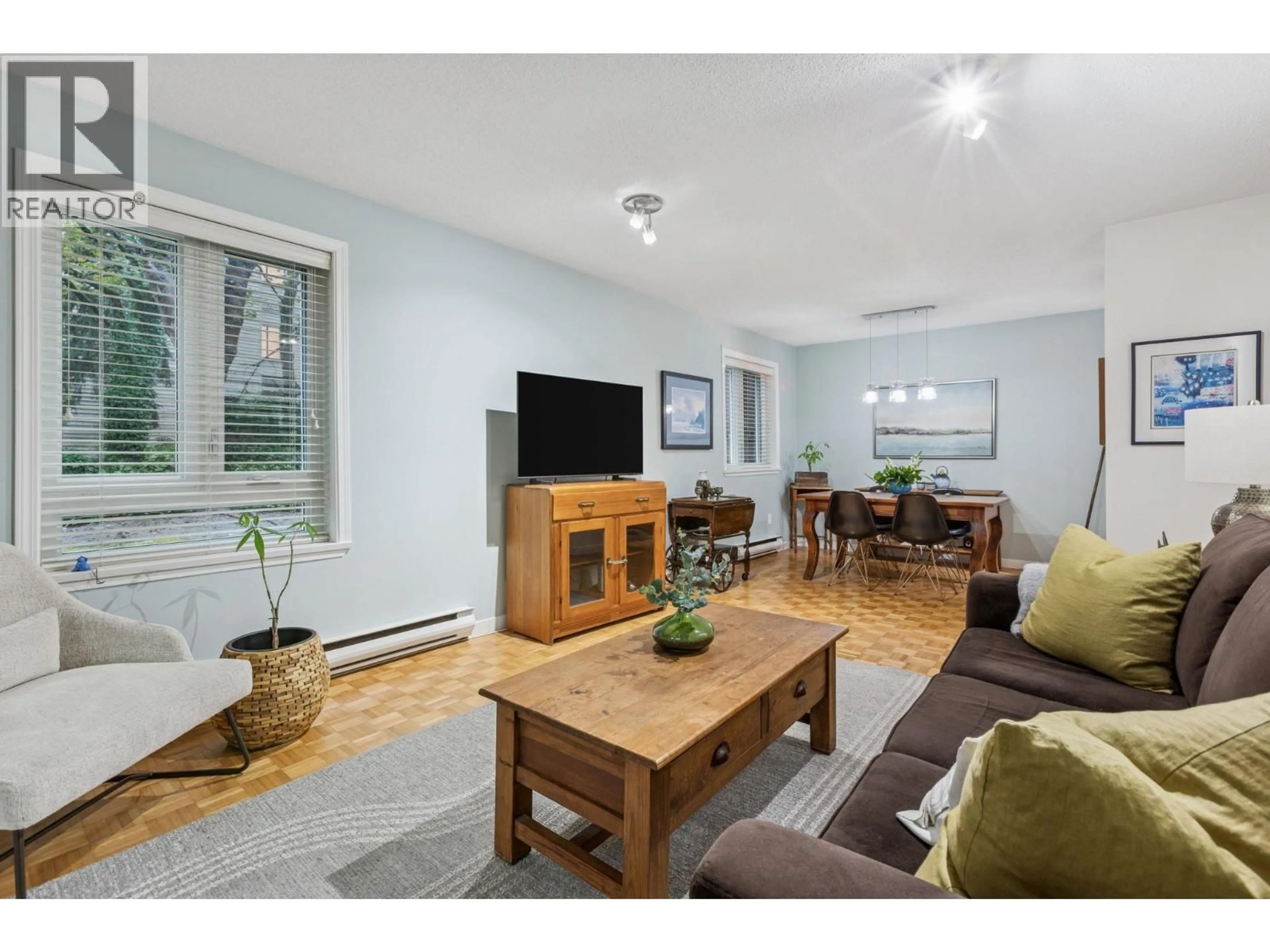 Living room with furniture, wood/laminate floor for 112 - 1429 4TH AVENUE, Vancouver British Columbia V5N1J6