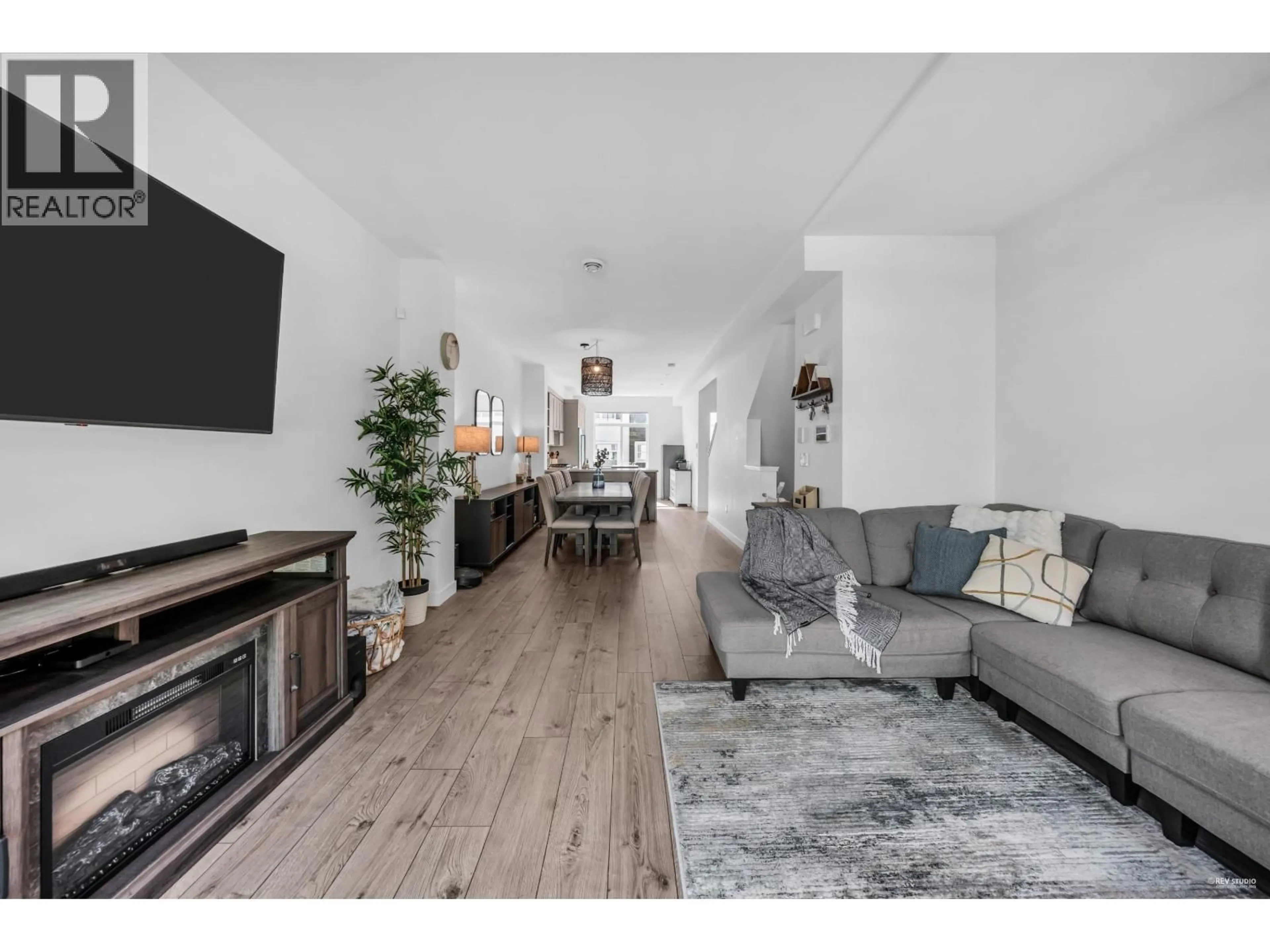 Living room with furniture, wood/laminate floor for 141 - 1220 ROCKLIN STREET, Coquitlam British Columbia V3B0R6