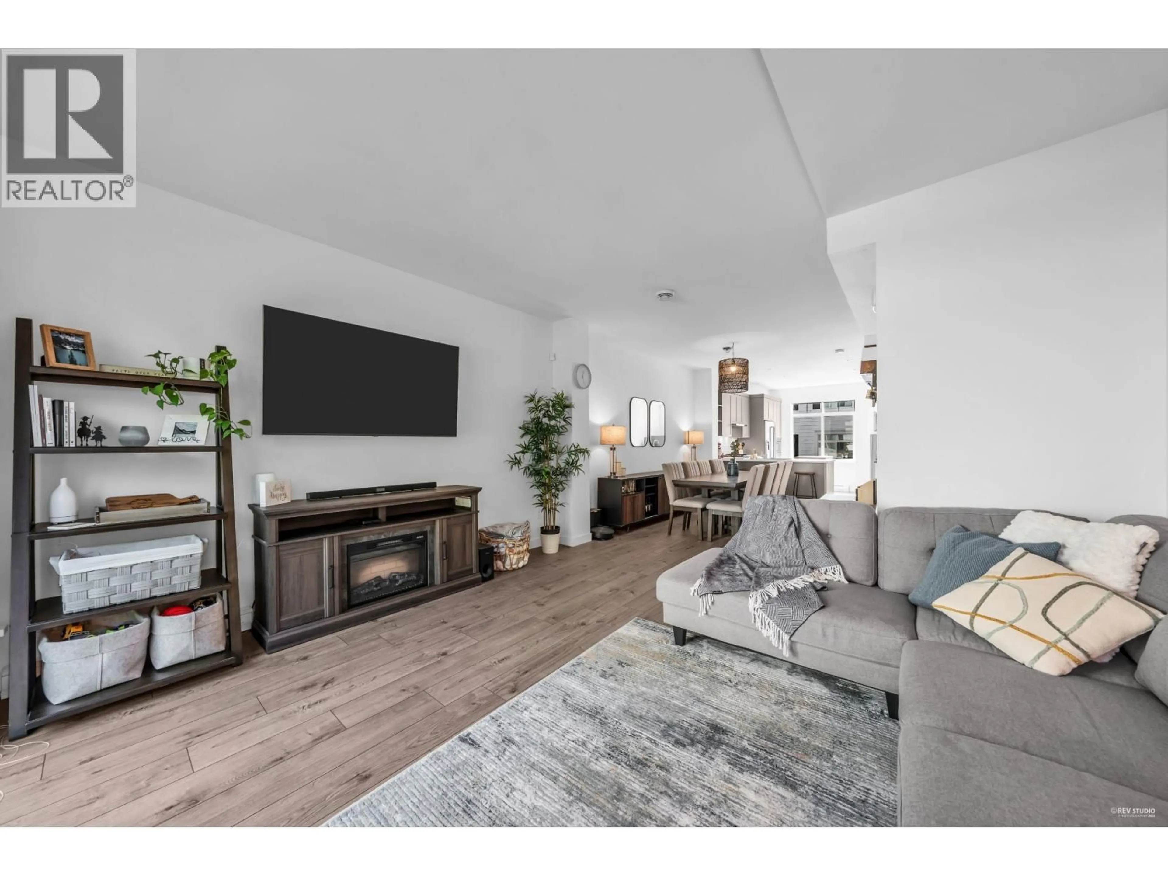 Living room with furniture, wood/laminate floor for 141 - 1220 ROCKLIN STREET, Coquitlam British Columbia V3B0R6