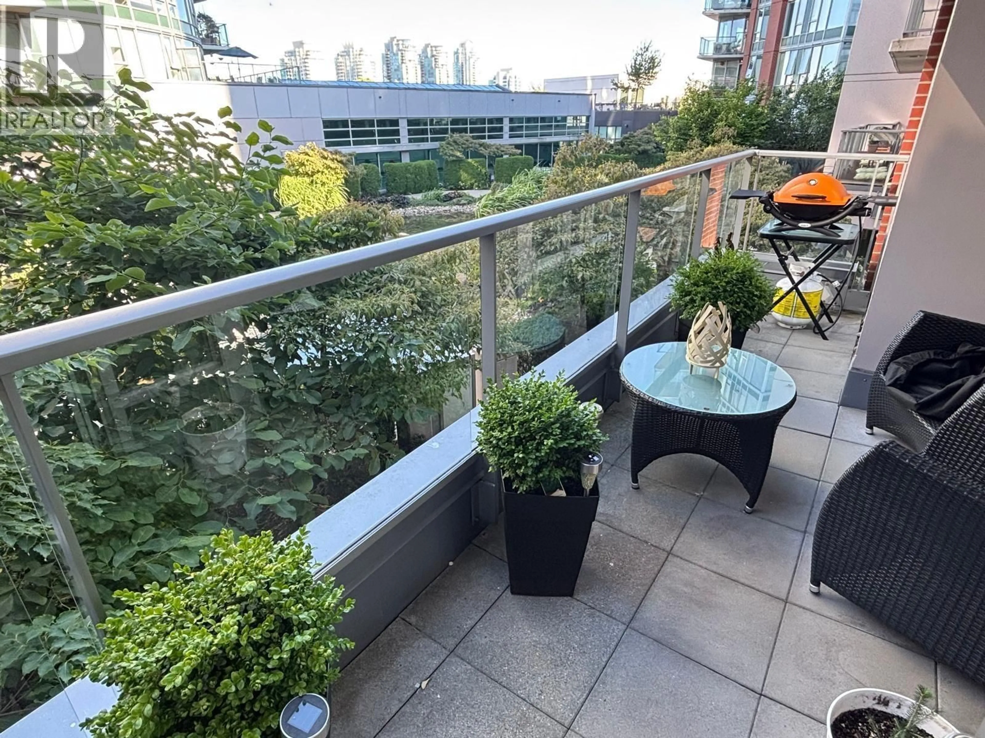 Patio, city buildings view from balcony for 501 - 618 ABBOTT STREET, Vancouver British Columbia V6B0C1