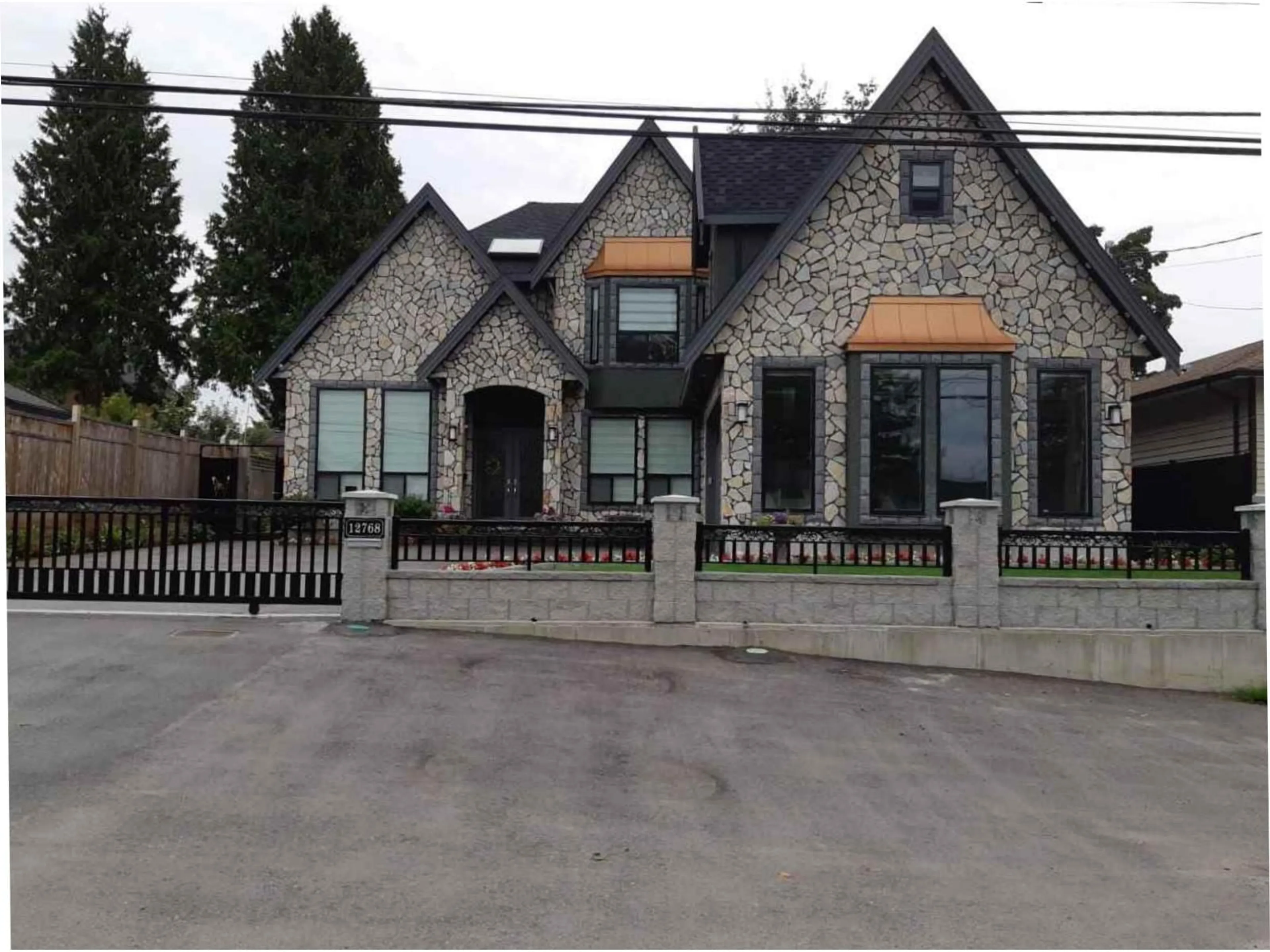 Home with brick exterior material, street for 12768 97A, Surrey British Columbia V3V2H5