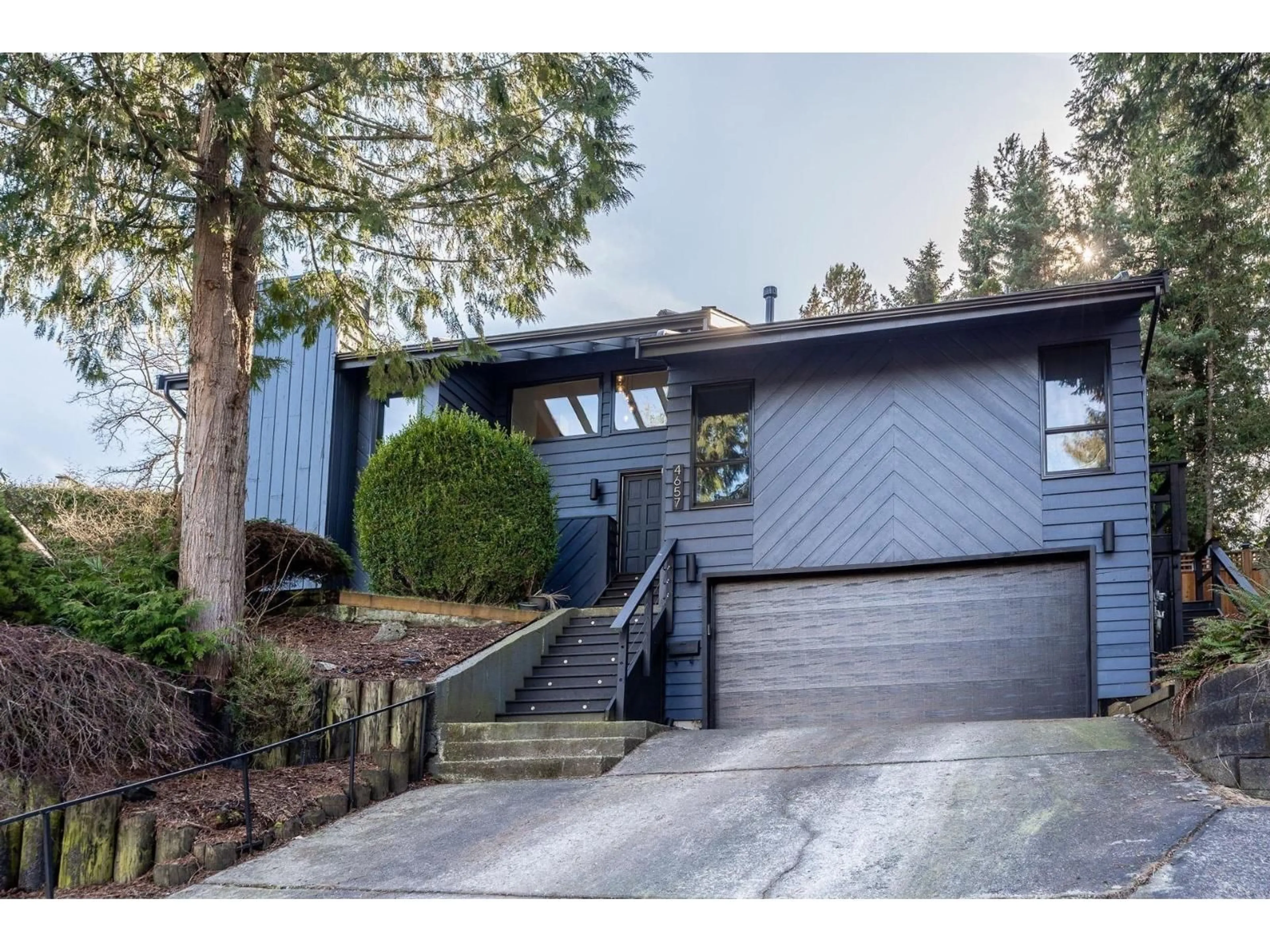 Home with vinyl exterior material, street for 4657 208A, Langley British Columbia V3A7E5