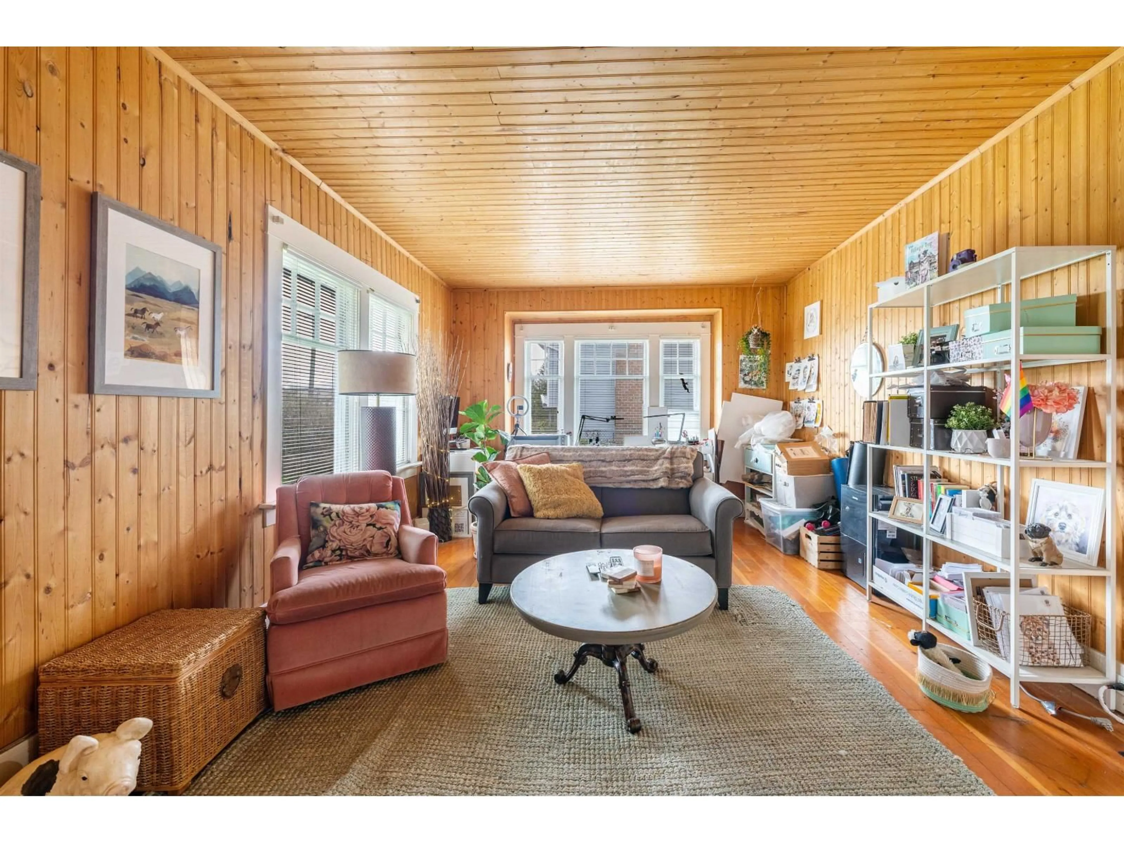 Living room with furniture, wood/laminate floor for 6119 176, Surrey British Columbia V3S4E8