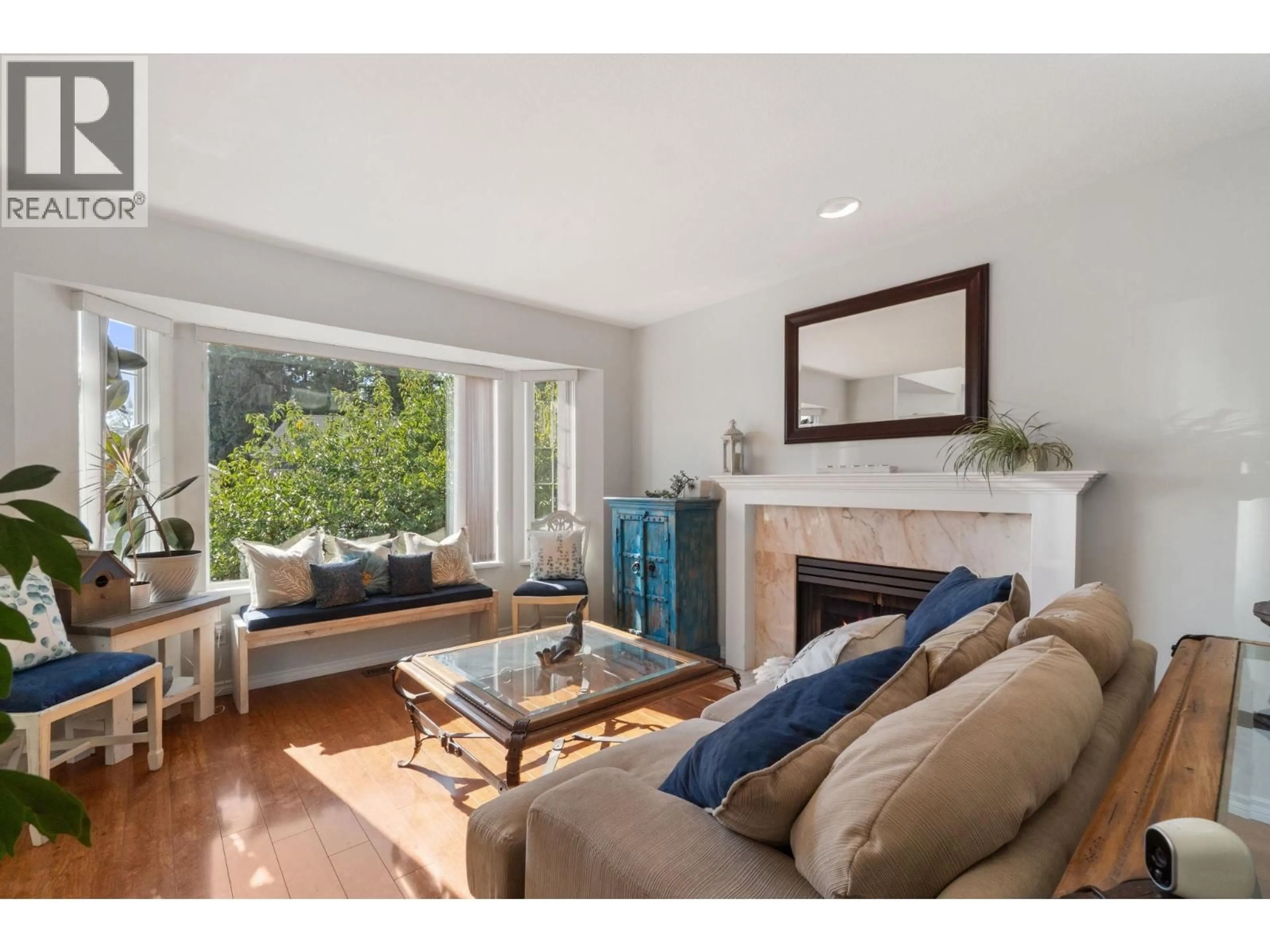 Living room with furniture, wood/laminate floor for 2939 CLIFFROSE CRESCENT, Coquitlam British Columbia V3E2T2