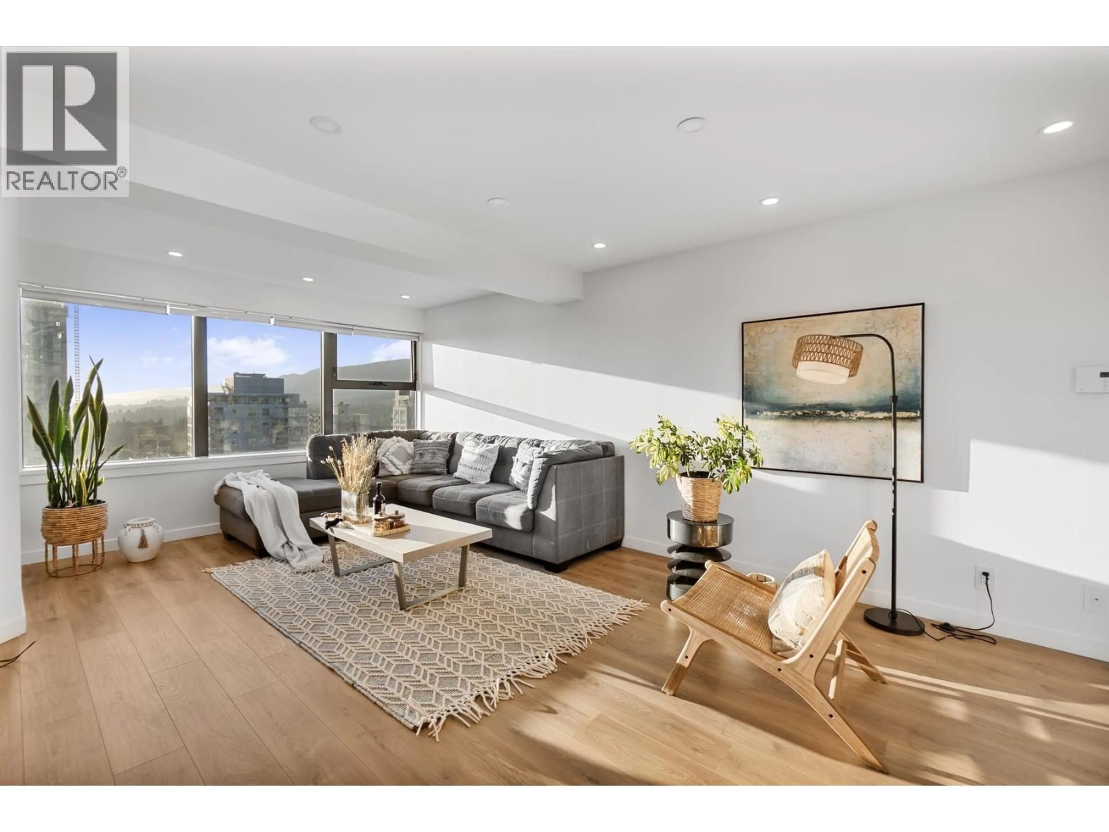 Living room with furniture, wood/laminate floor for 1304 - 1515 EASTERN AVENUE, North Vancouver British Columbia V7L4R2