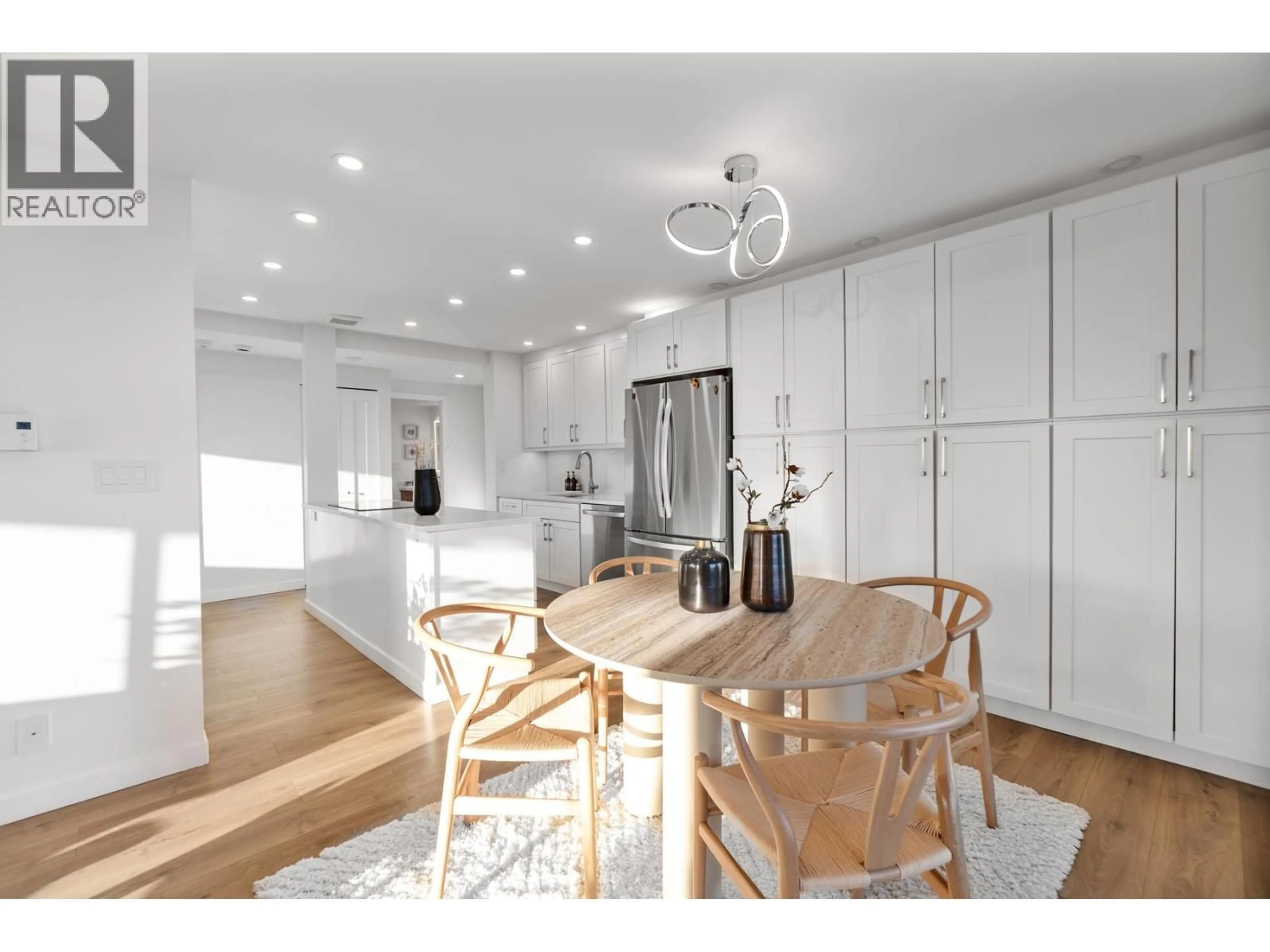 Open concept kitchen, wood/laminate floor for 1304 - 1515 EASTERN AVENUE, North Vancouver British Columbia V7L4R2