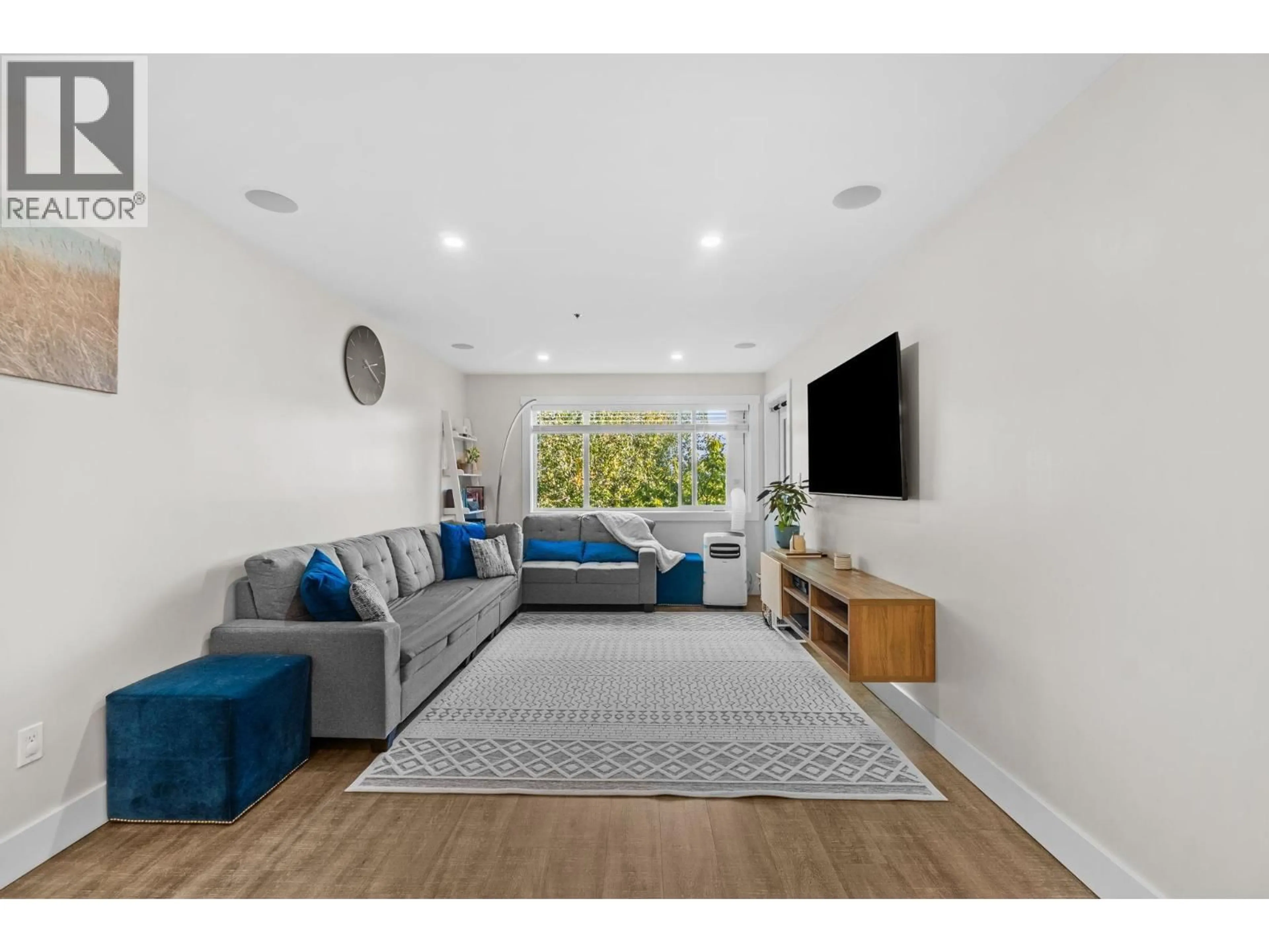 Living room with furniture, unknown for 404 - 1310 CARIBOO STREET, New Westminster British Columbia V3M1X2