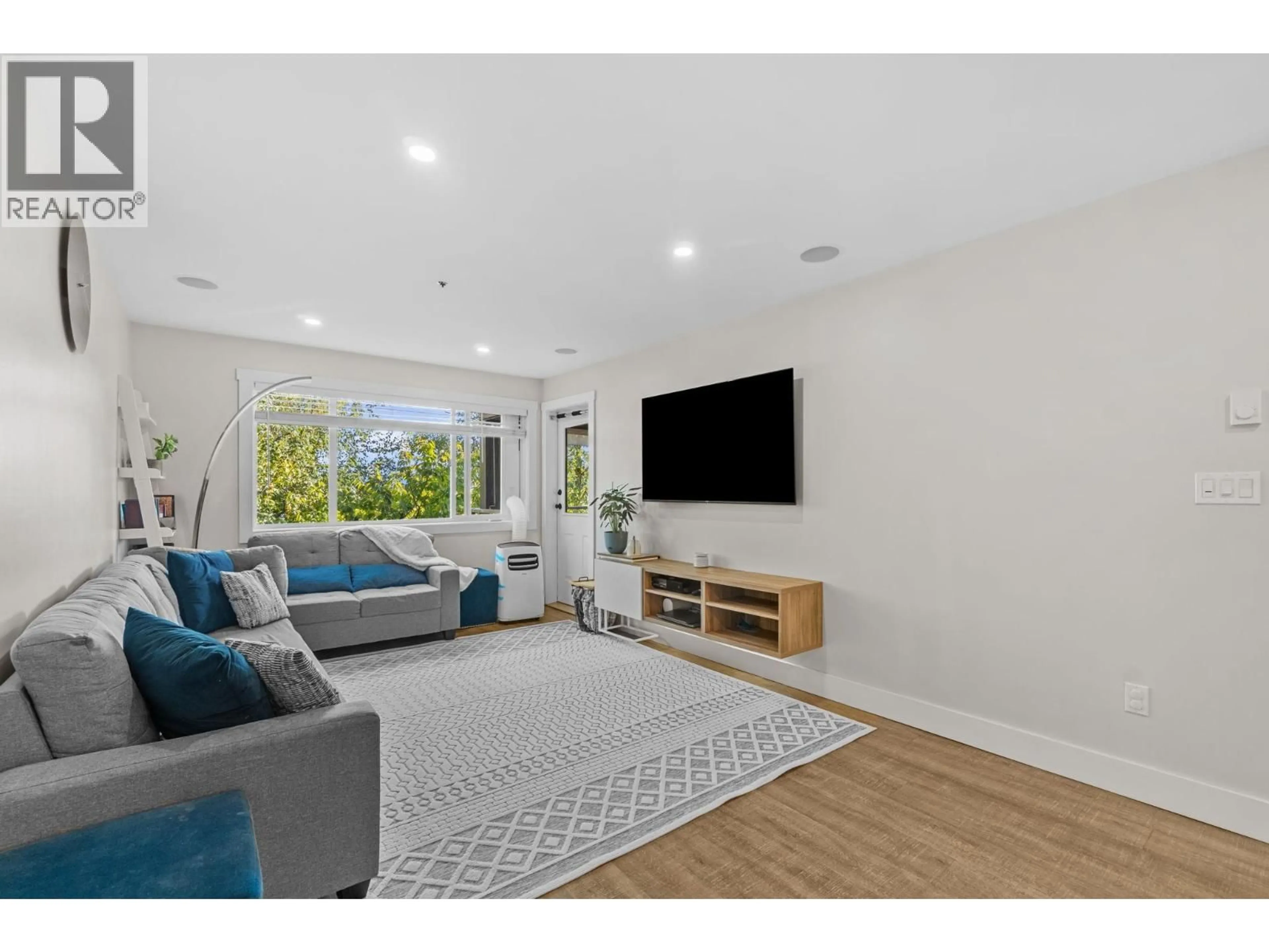 Living room with furniture, unknown for 404 - 1310 CARIBOO STREET, New Westminster British Columbia V3M1X2