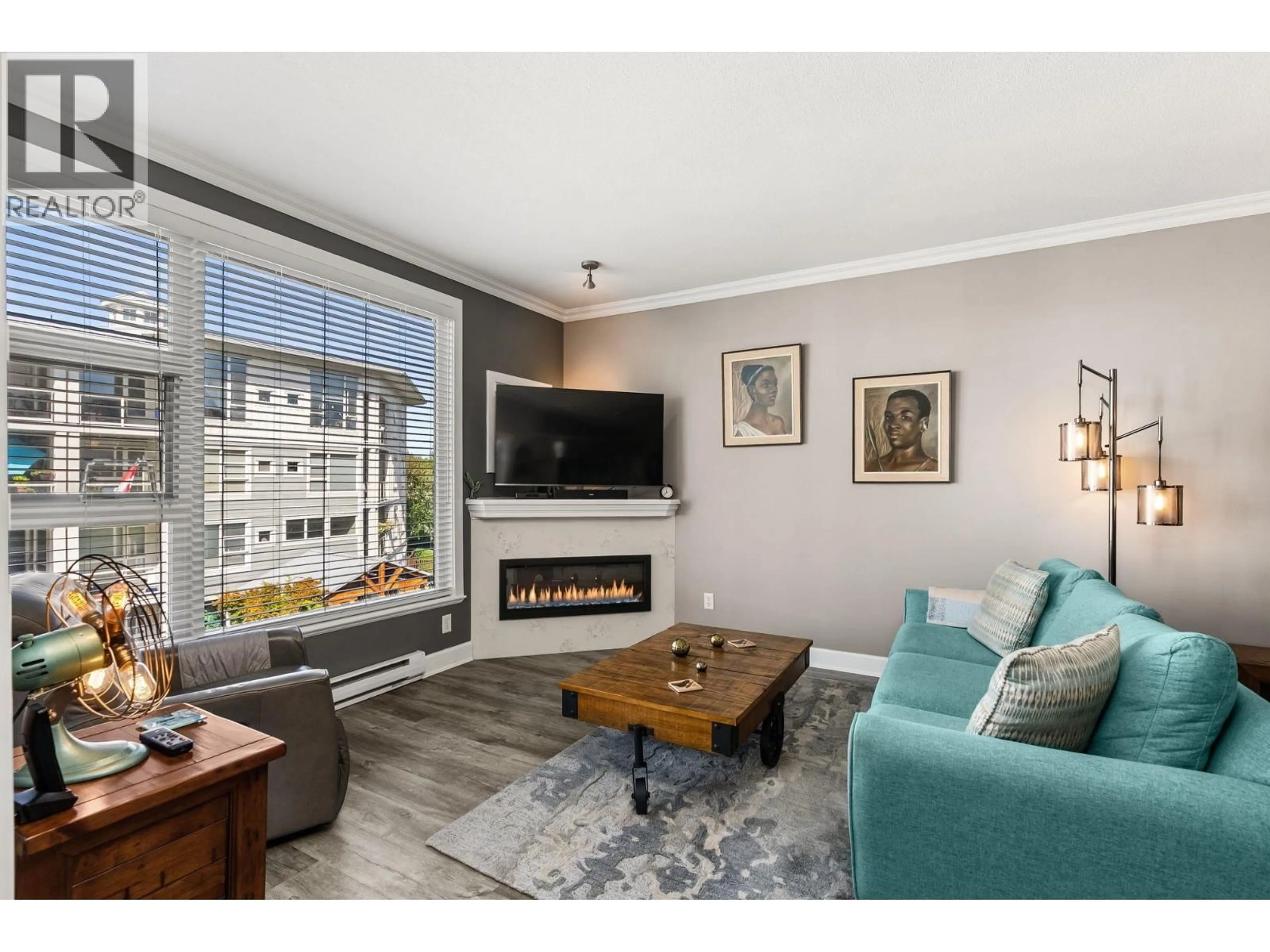 Living room with furniture, wood/laminate floor for 315 - 4600 WESTWATER DRIVE, Richmond British Columbia V7E6S2