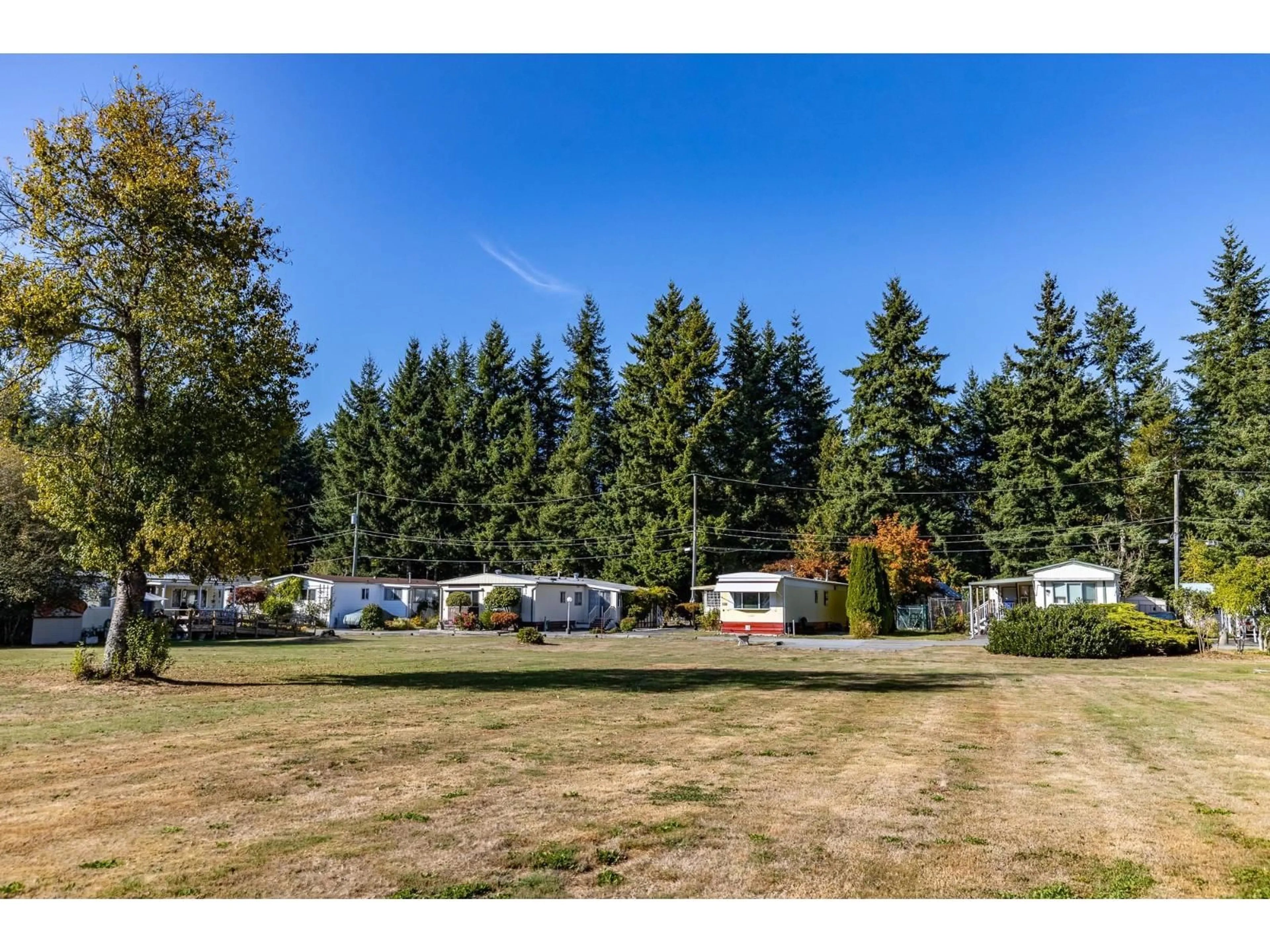 A pic from outside/outdoor area/front of a property/back of a property/a pic from drone, unknown for 118 - 3031 200, Langley British Columbia V2Z1N5