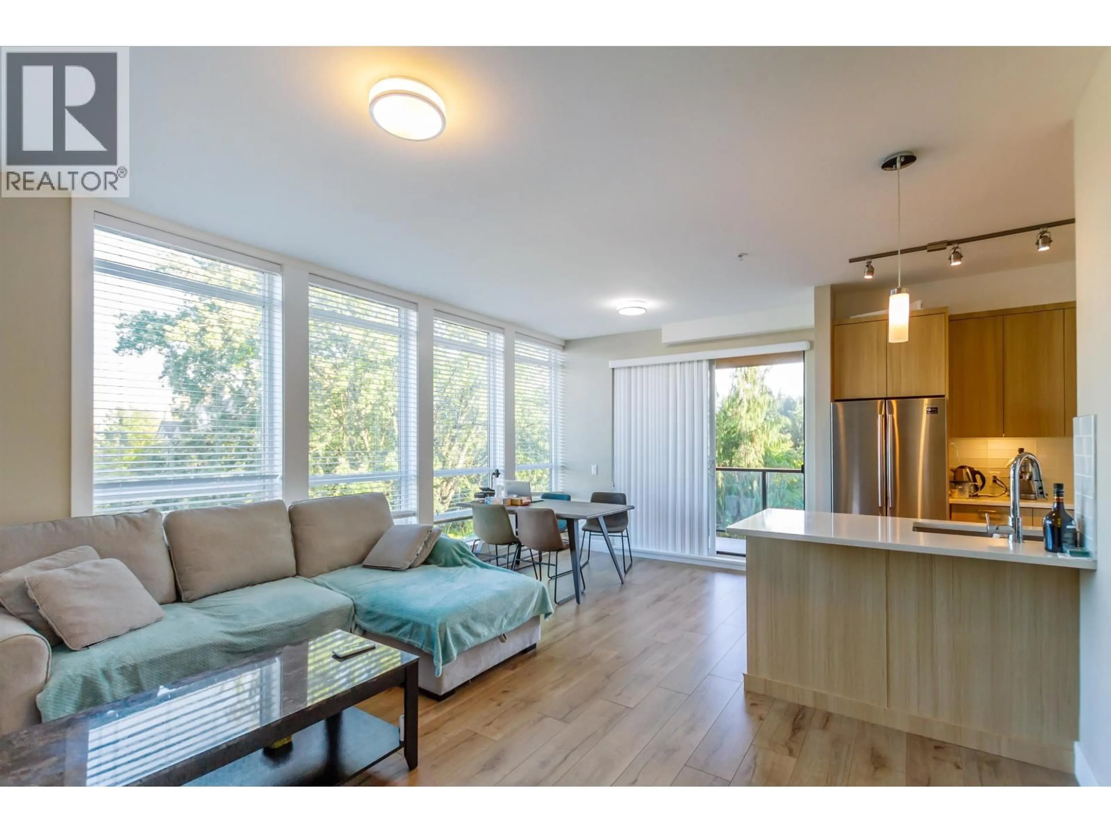 Open concept kitchen, wood/laminate floor for 316 - 12460 191 STREET, Pitt Meadows British Columbia V3Y2J2