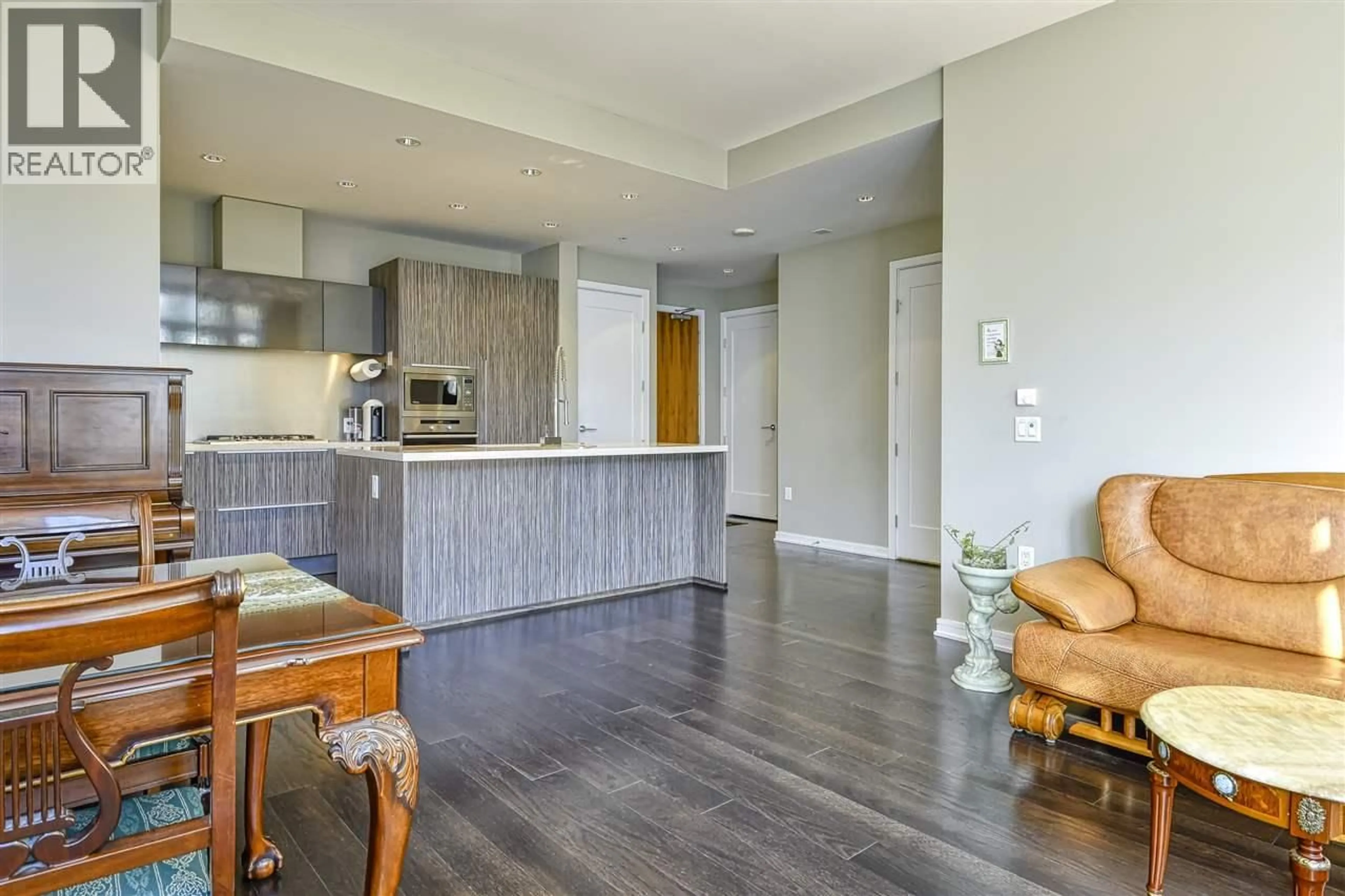 Open concept kitchen, wood/laminate floor for 310 - 1616 COLUMBIA STREET, Vancouver British Columbia V5Y0B7