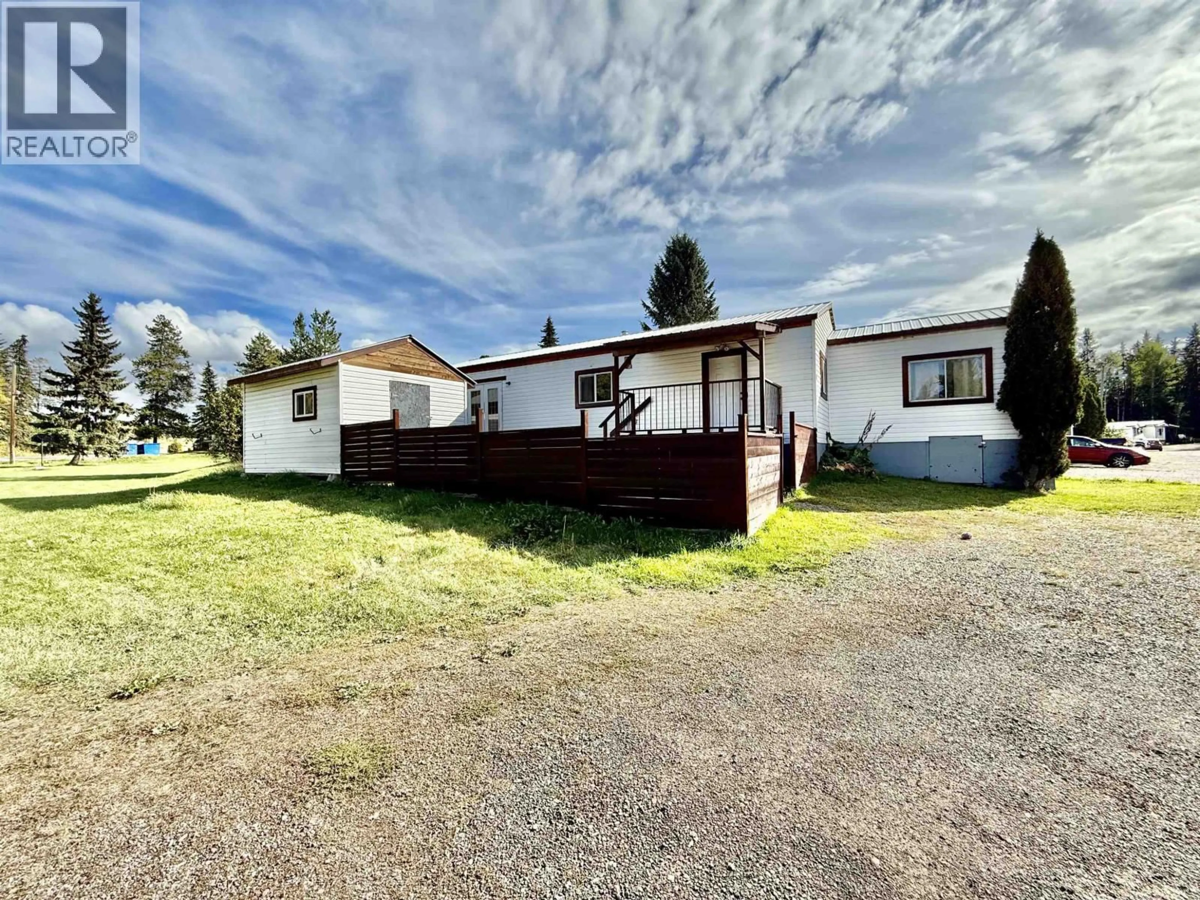 A pic from outside/outdoor area/front of a property/back of a property/a pic from drone, street for 21 - 95 LAIDLAW ROAD, Smithers British Columbia V0J2N6