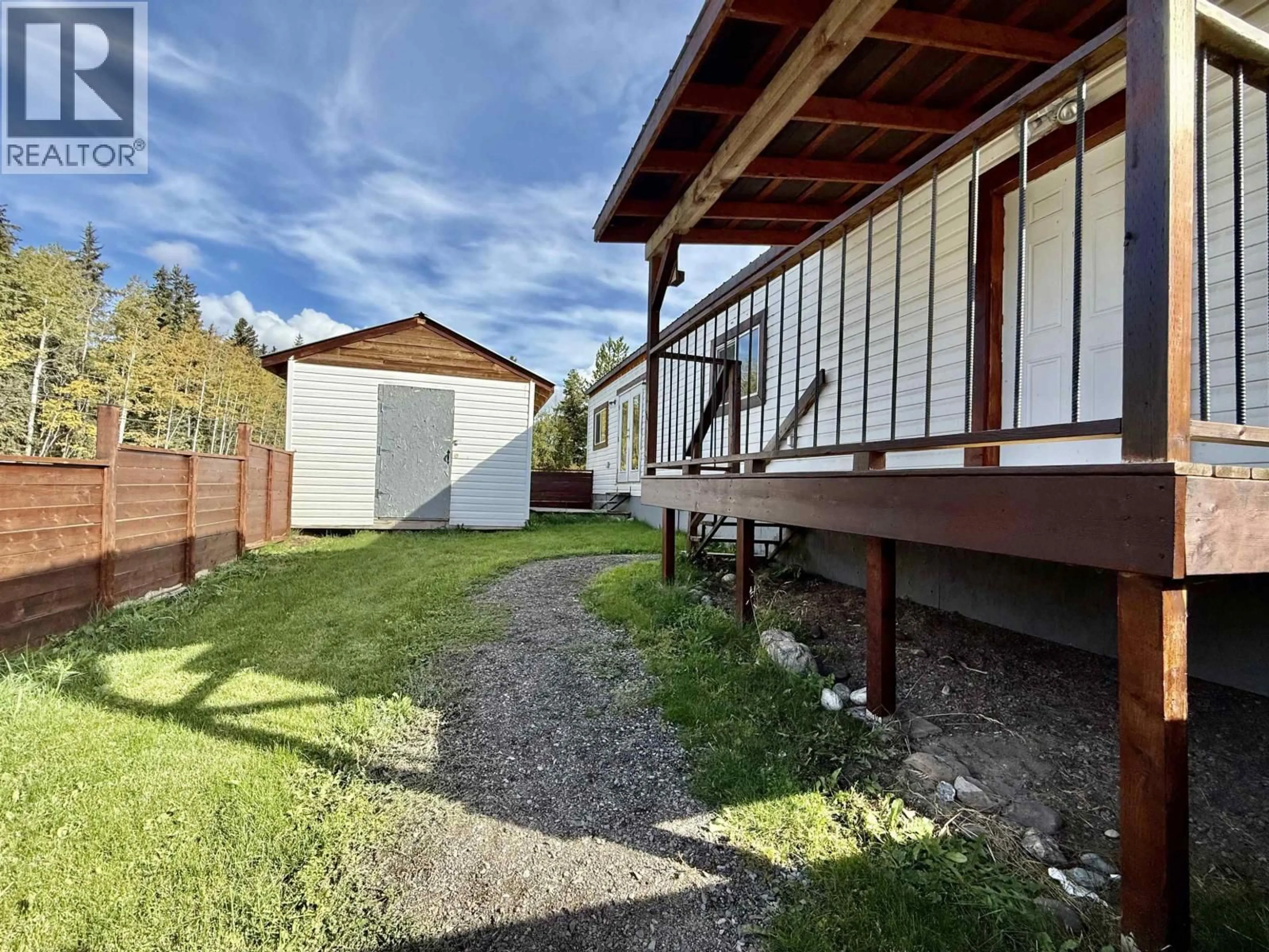 A pic from outside/outdoor area/front of a property/back of a property/a pic from drone, street for 21 - 95 LAIDLAW ROAD, Smithers British Columbia V0J2N6