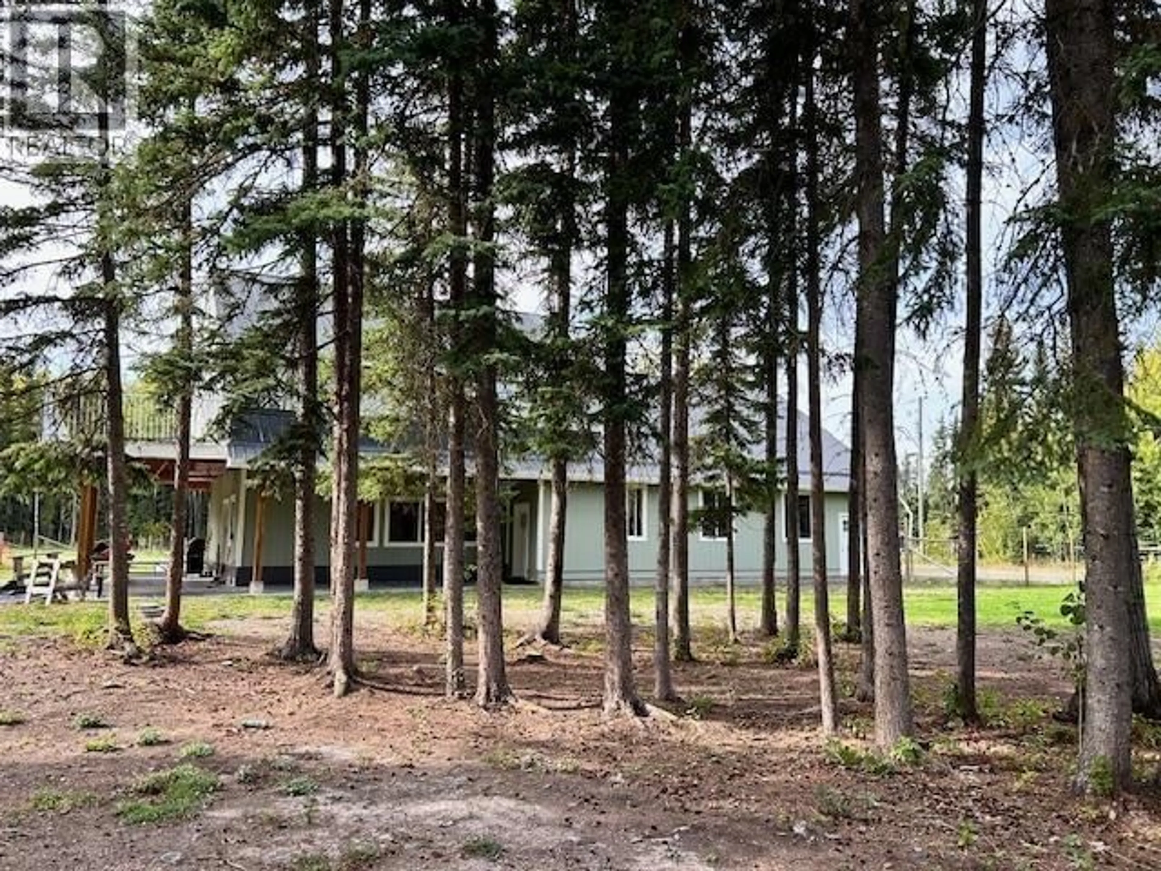 A pic from outside/outdoor area/front of a property/back of a property/a pic from drone, forest/trees view for 520 OAK STREET, Vanderhoof British Columbia V0J3A1