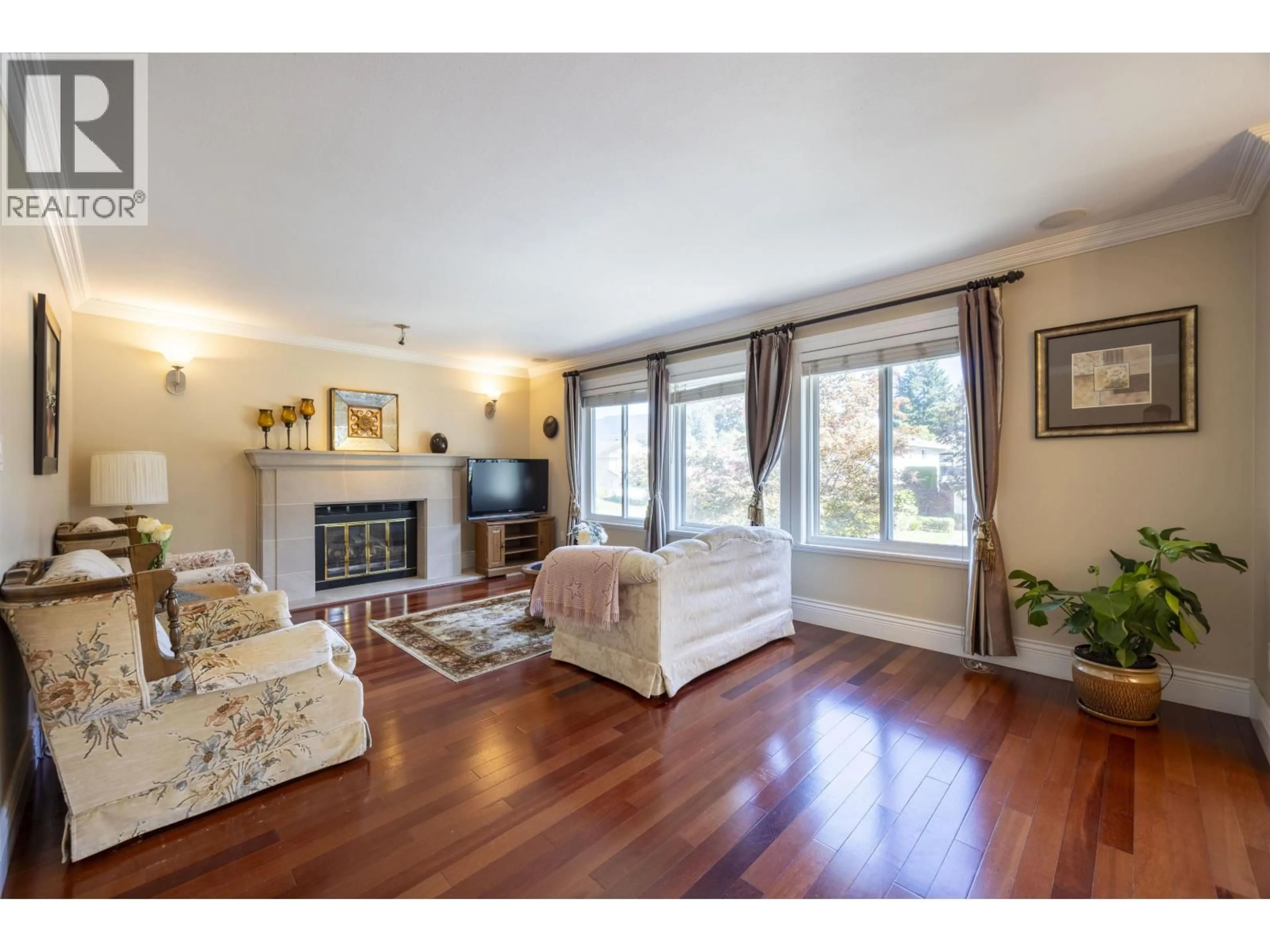 Living room with furniture, wood/laminate floor for 2845 MCCOOMB DRIVE, Coquitlam British Columbia V3B6L2