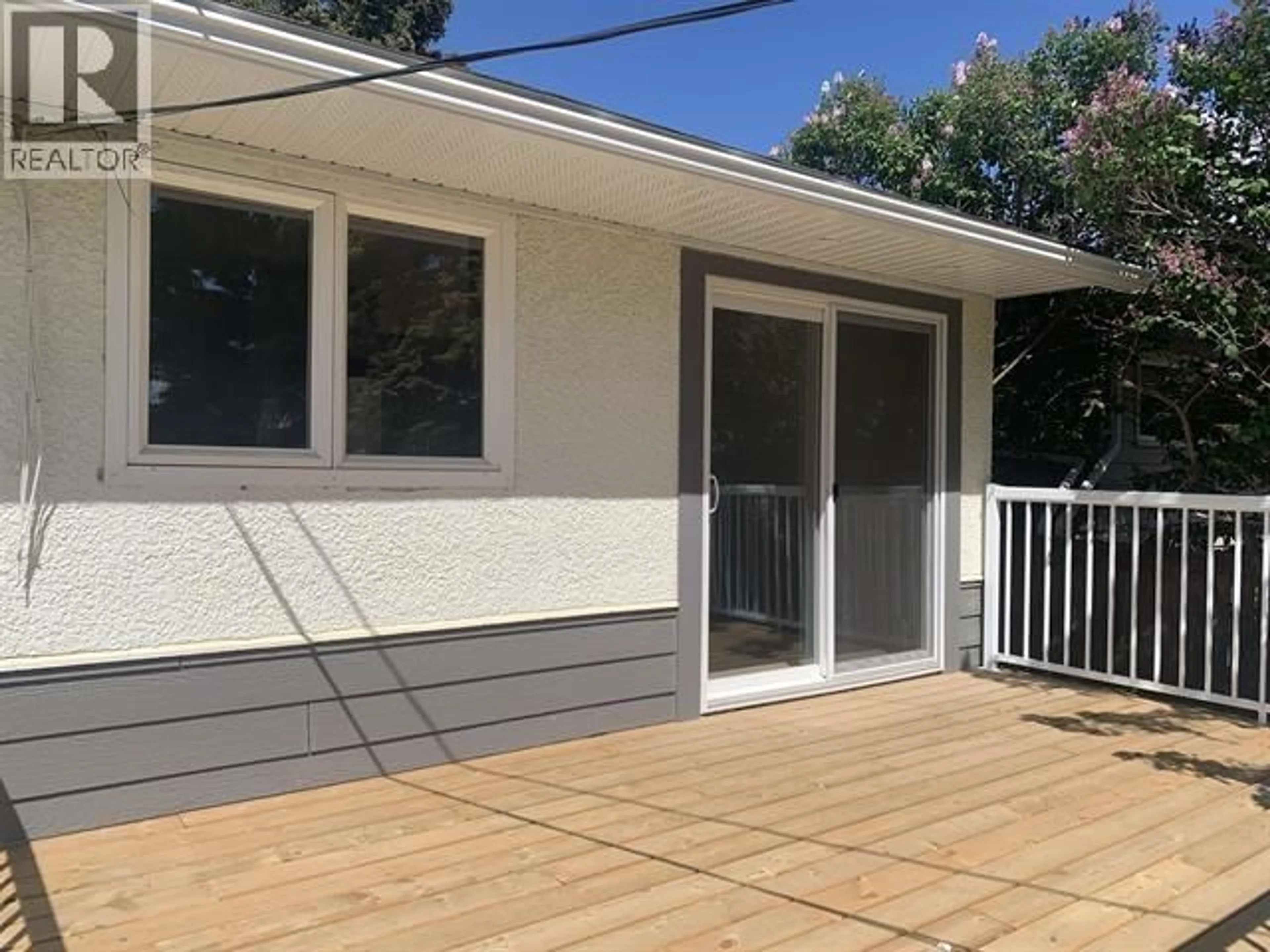 Home with vinyl exterior material, street for 10711 103 AVENUE, Fort St. John British Columbia V1J2J2