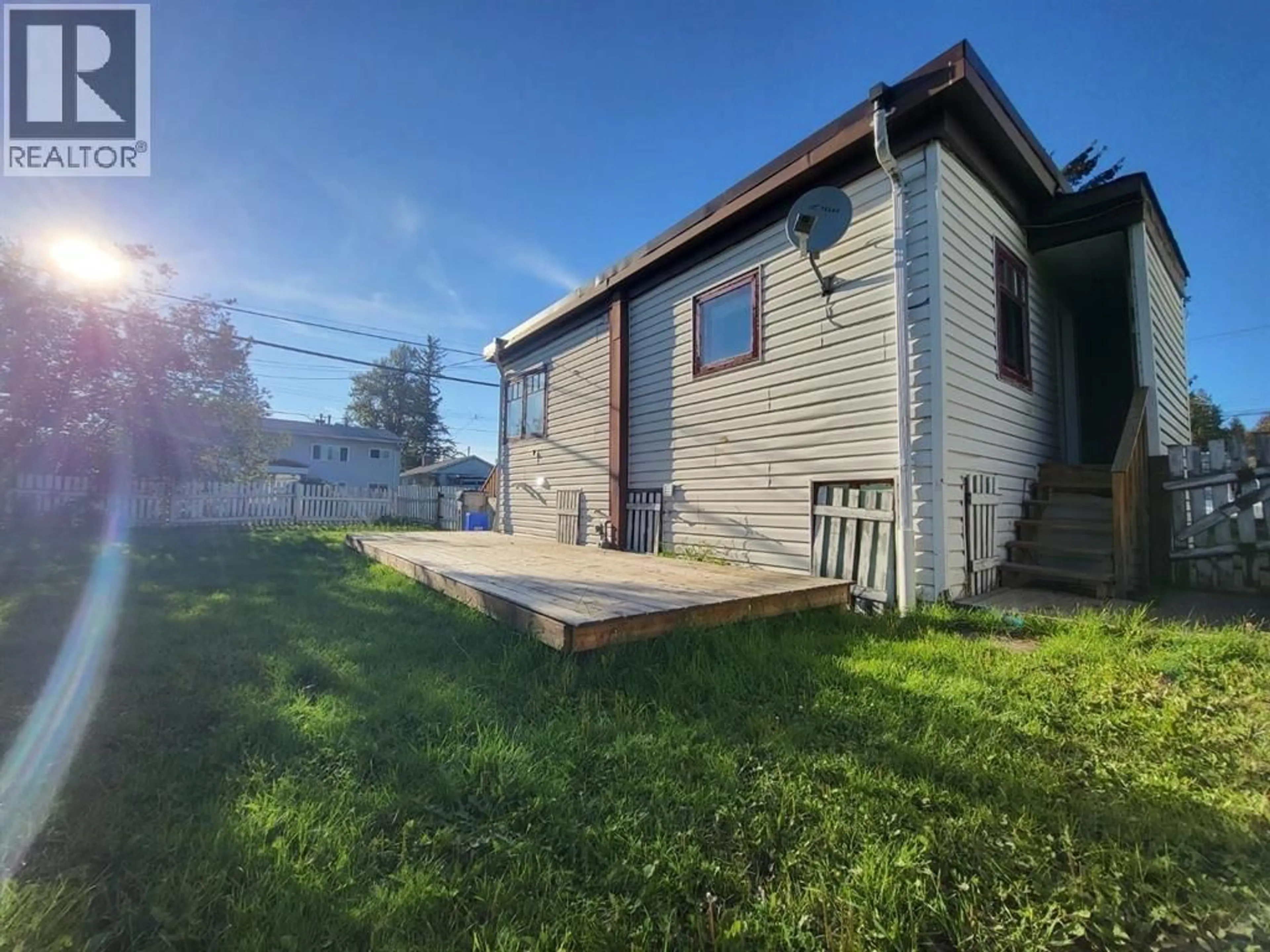 A pic from outside/outdoor area/front of a property/back of a property/a pic from drone, building for 424 BOWRON AVENUE, Quesnel British Columbia V2J2H5