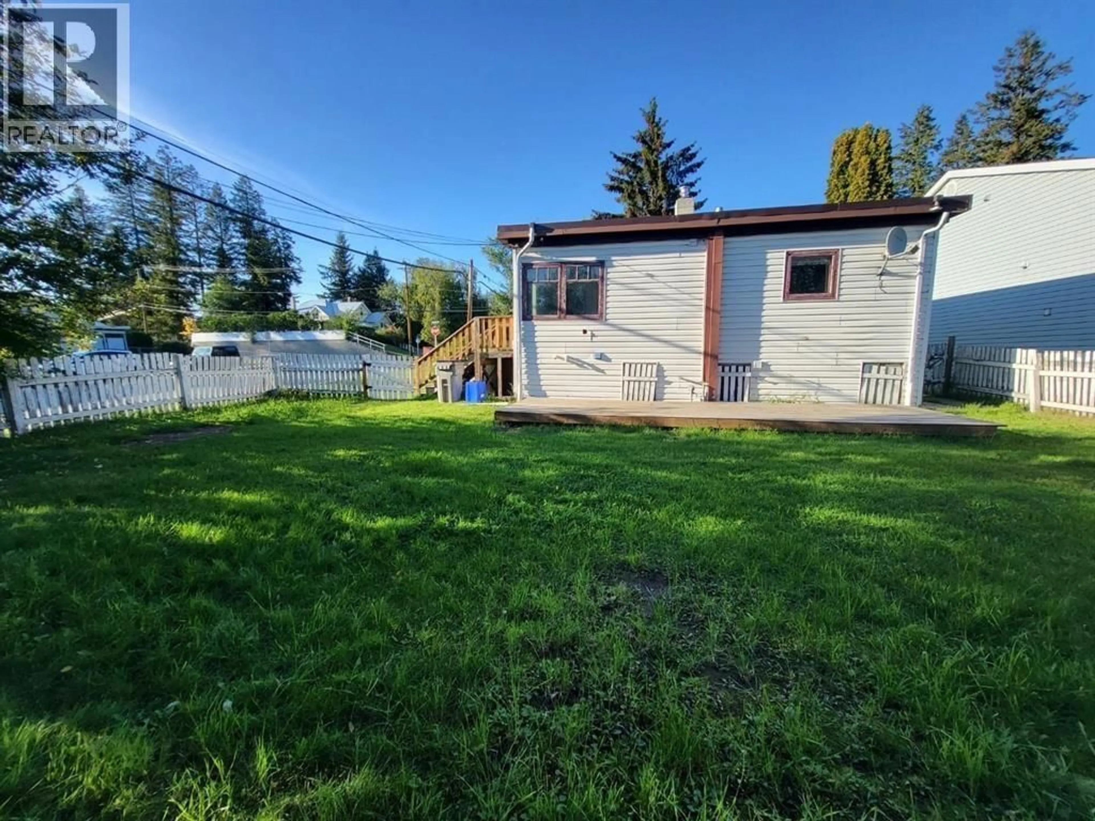 A pic from outside/outdoor area/front of a property/back of a property/a pic from drone, street for 424 BOWRON AVENUE, Quesnel British Columbia V2J2H5