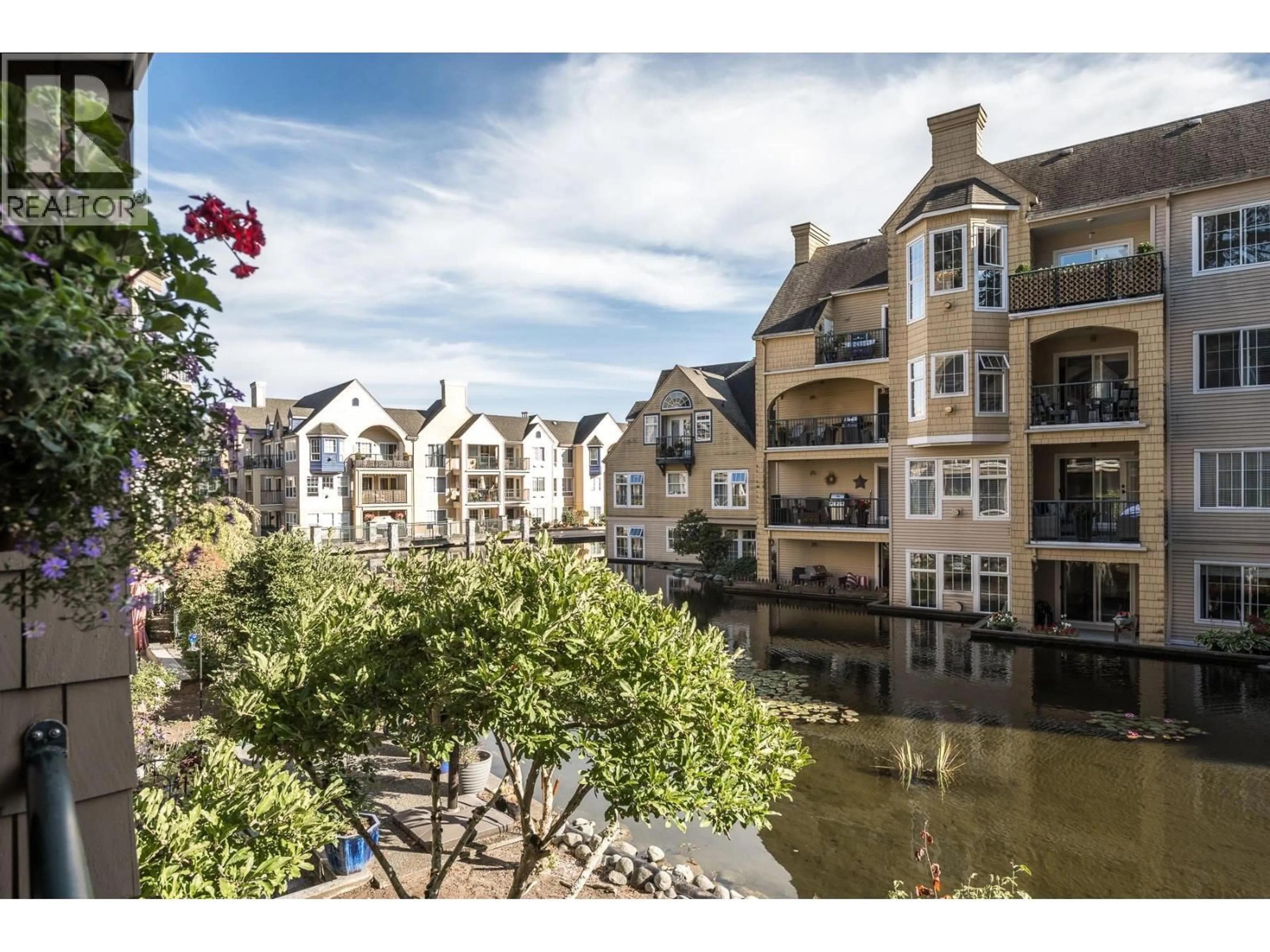 A pic from outside/outdoor area/front of a property/back of a property/a pic from drone, water/lake/river/ocean view for 205 - 5518 14TH AVENUE AVENUE, Delta British Columbia V4M4E0