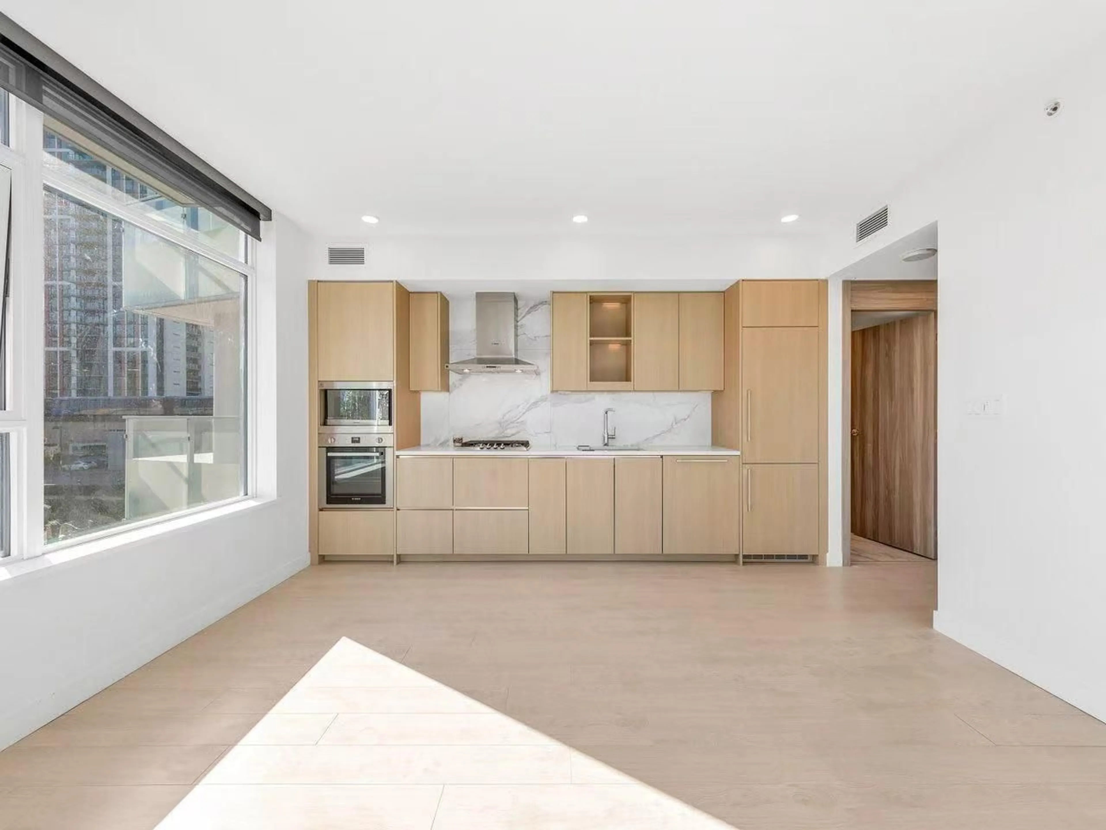Open concept kitchen, unknown for 407 - 9887 WHALLEY, Surrey British Columbia V3T0P4