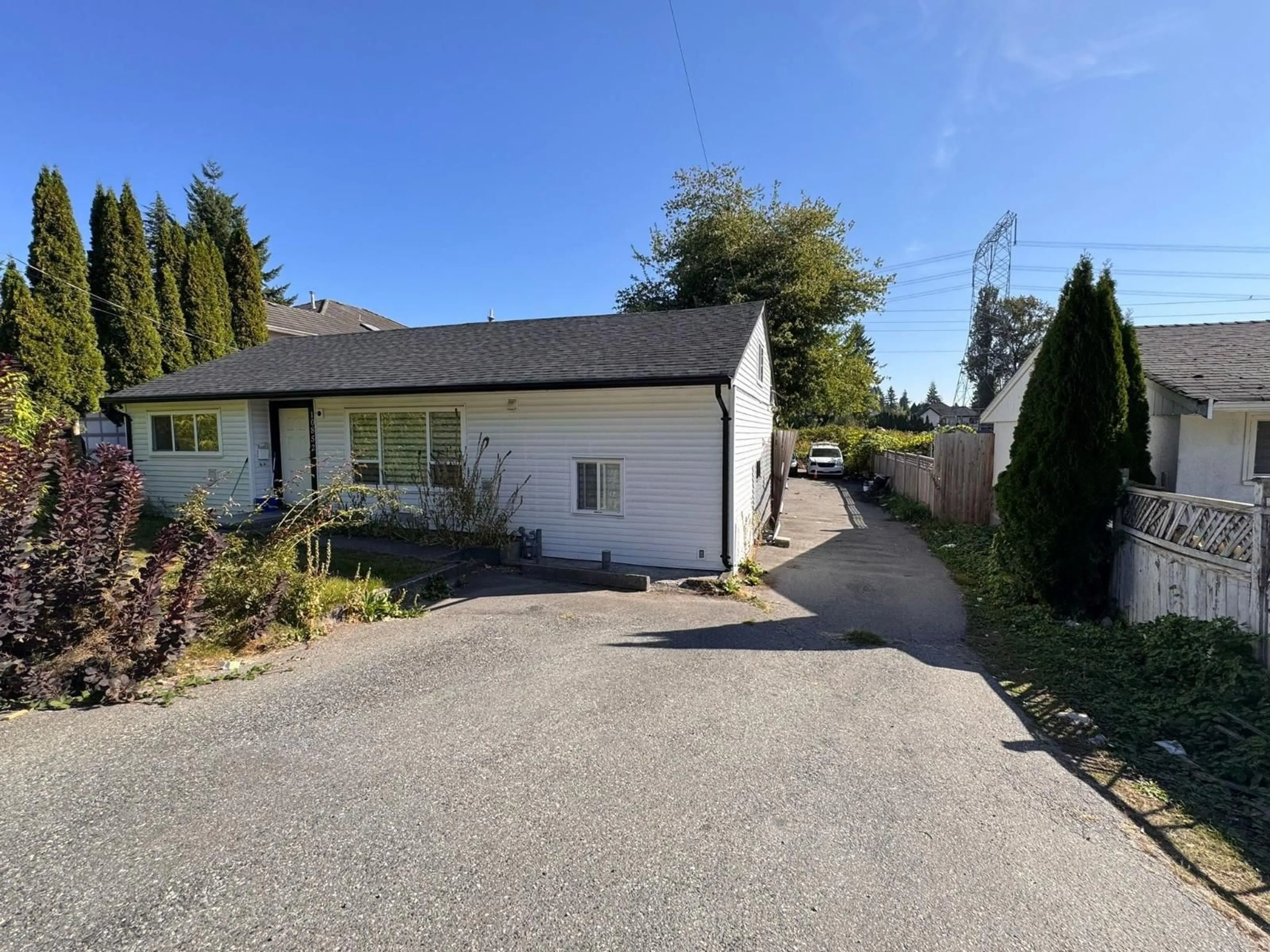 A pic from outside/outdoor area/front of a property/back of a property/a pic from drone, street for 10852 140, Surrey British Columbia V3R3G2