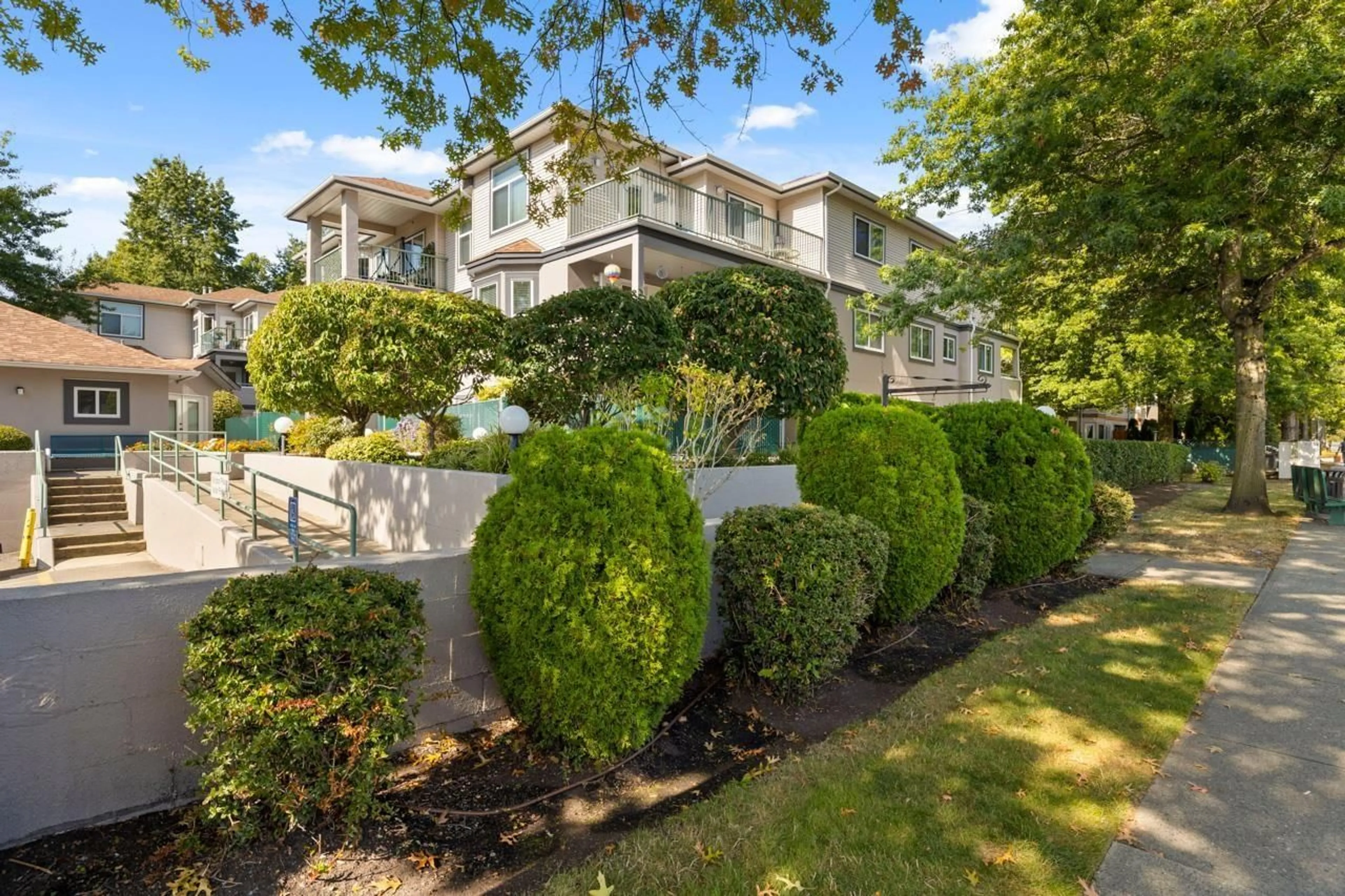A pic from outside/outdoor area/front of a property/back of a property/a pic from drone, street for 107 - 5955 177B, Surrey British Columbia V3S4J7
