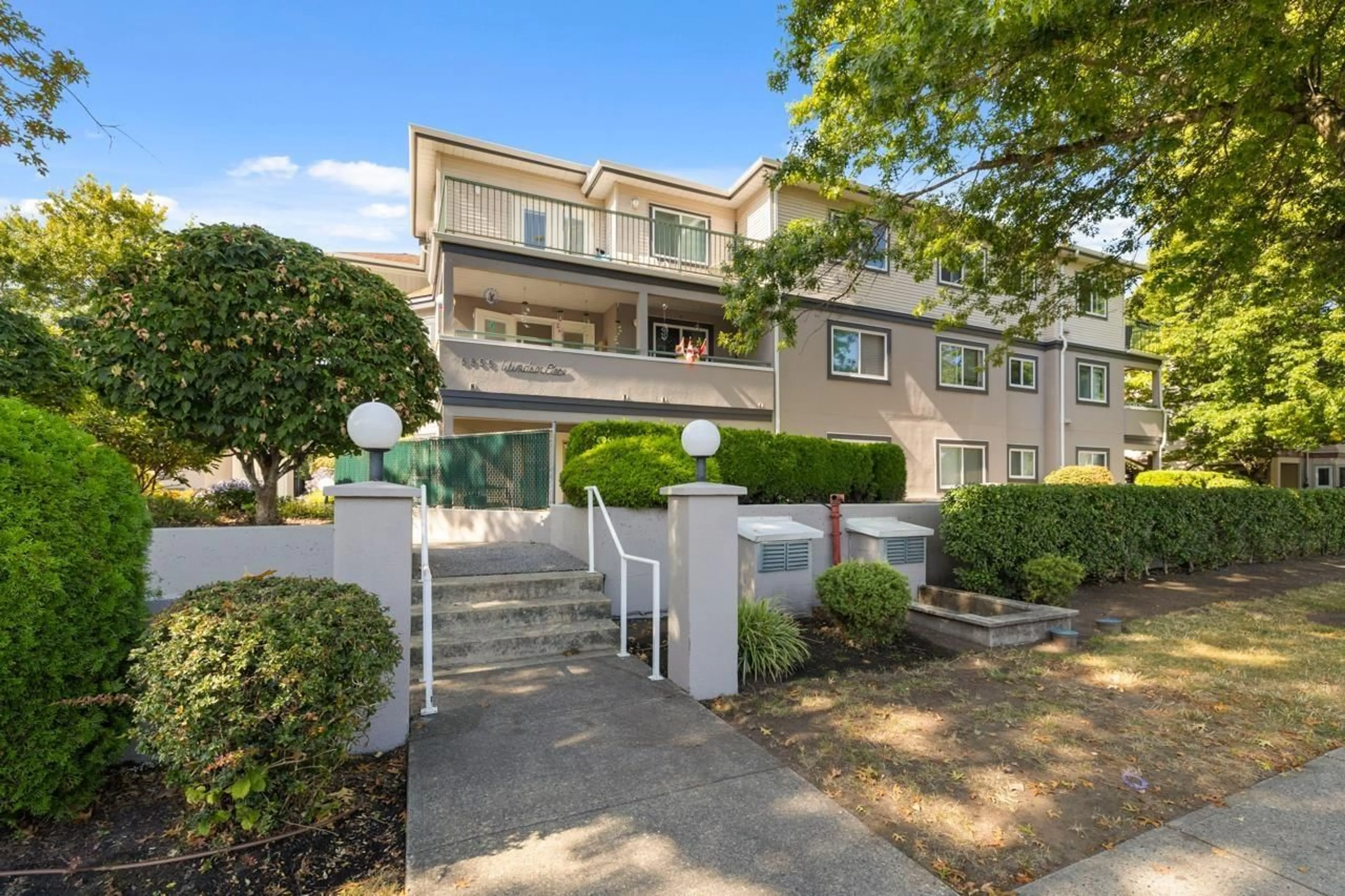 A pic from outside/outdoor area/front of a property/back of a property/a pic from drone, street for 107 - 5955 177B, Surrey British Columbia V3S4J7