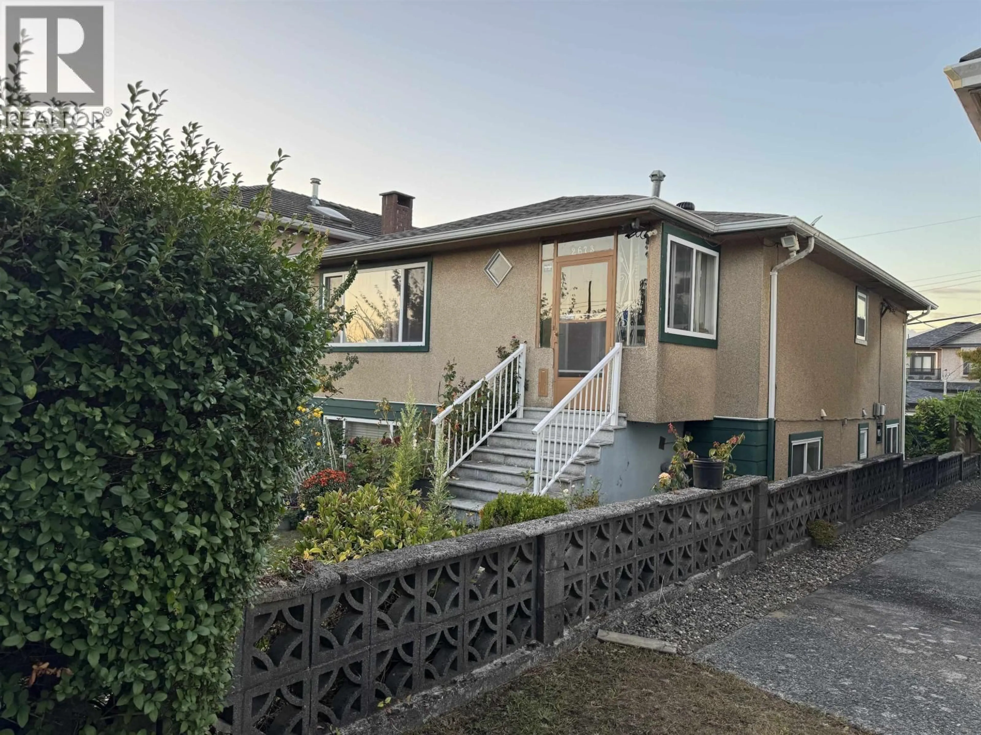 A pic from outside/outdoor area/front of a property/back of a property/a pic from drone, street for 2673 22ND AVENUE, Vancouver British Columbia V5M2X6
