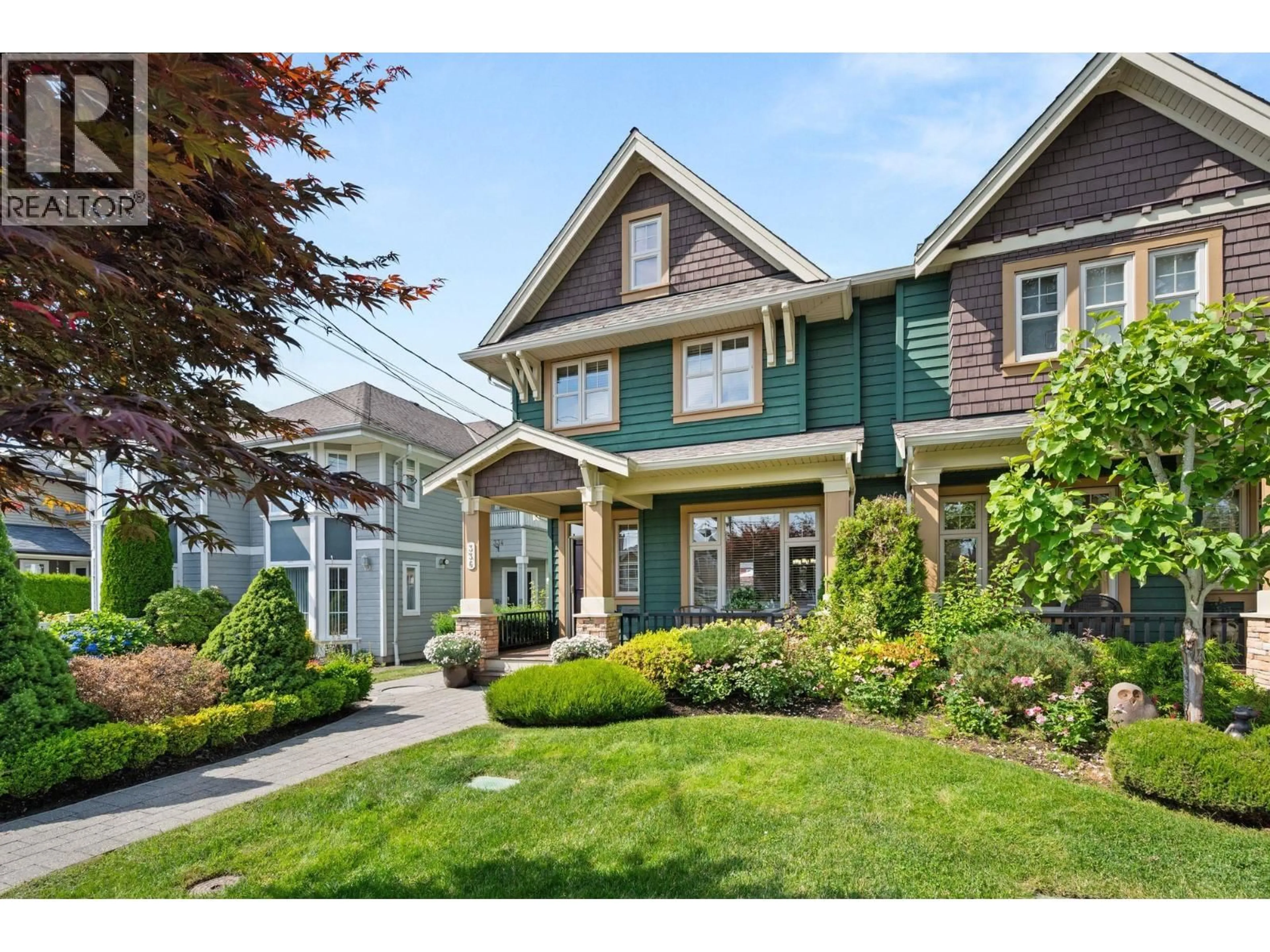 Home with vinyl exterior material, street for 336 12TH STREET, North Vancouver British Columbia V7L2J9