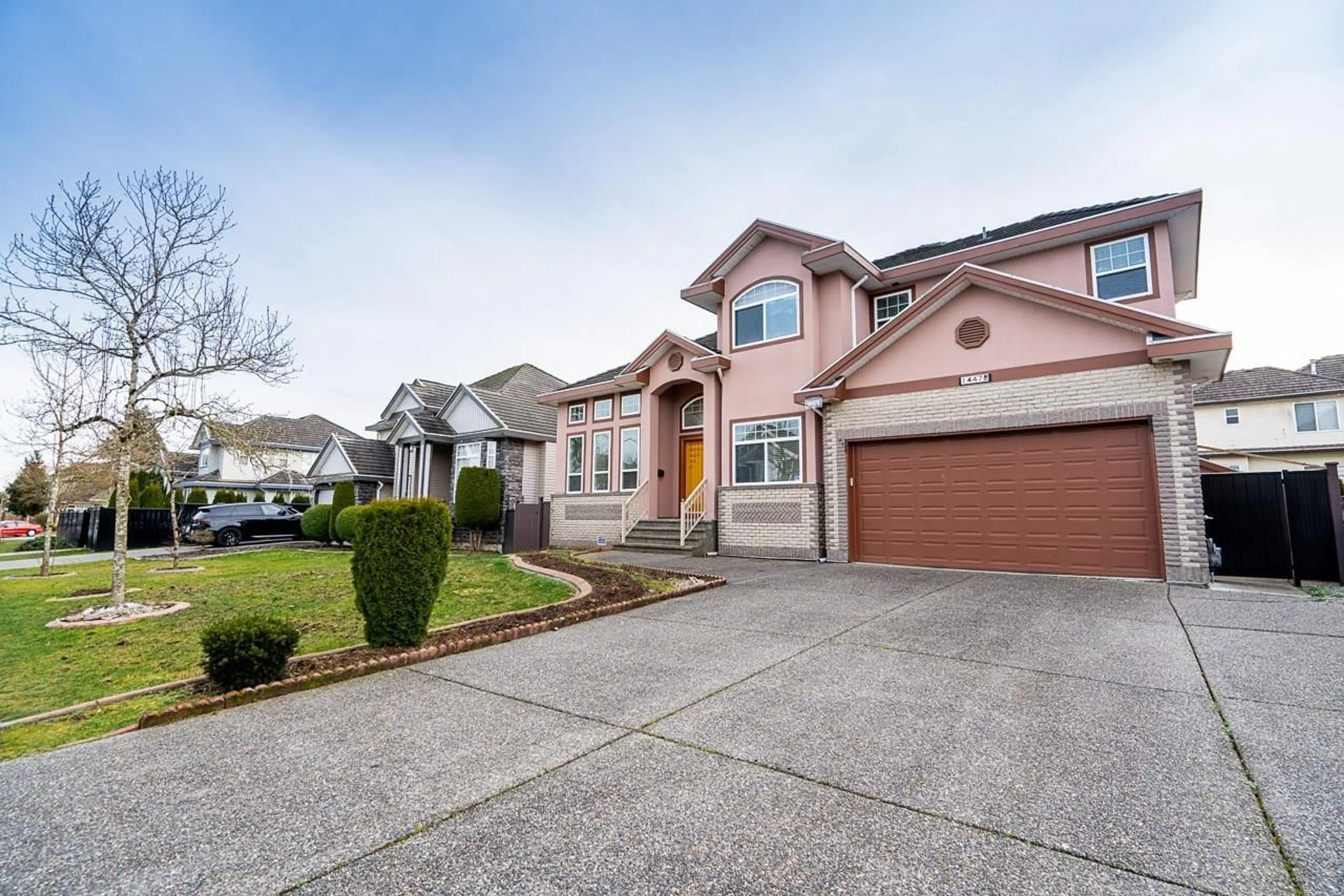 Home with vinyl exterior material, street for 14478 74A, Surrey British Columbia V3S0S3
