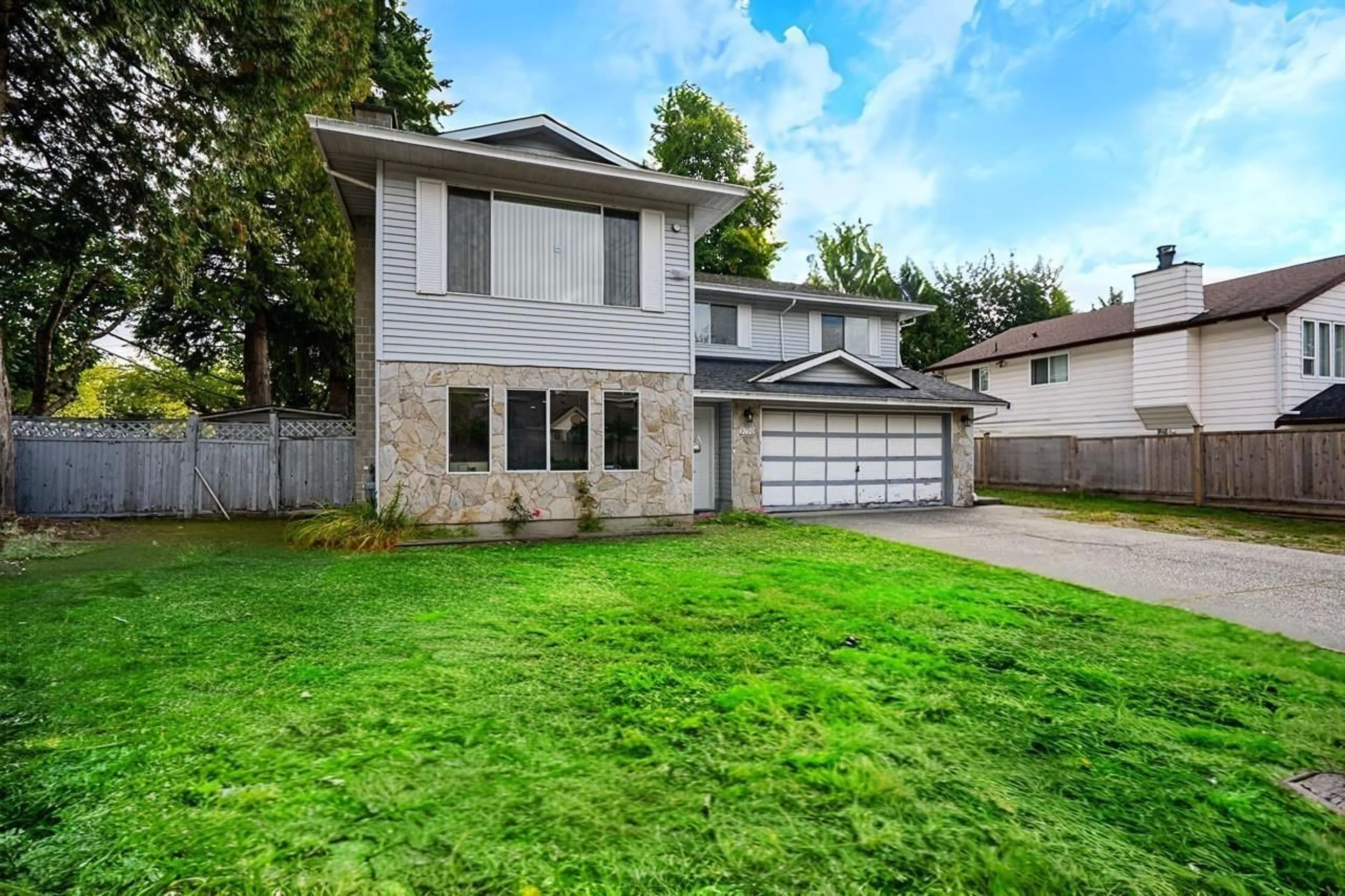 Home with vinyl exterior material, street for 9790 148A, Surrey British Columbia V3R8E5