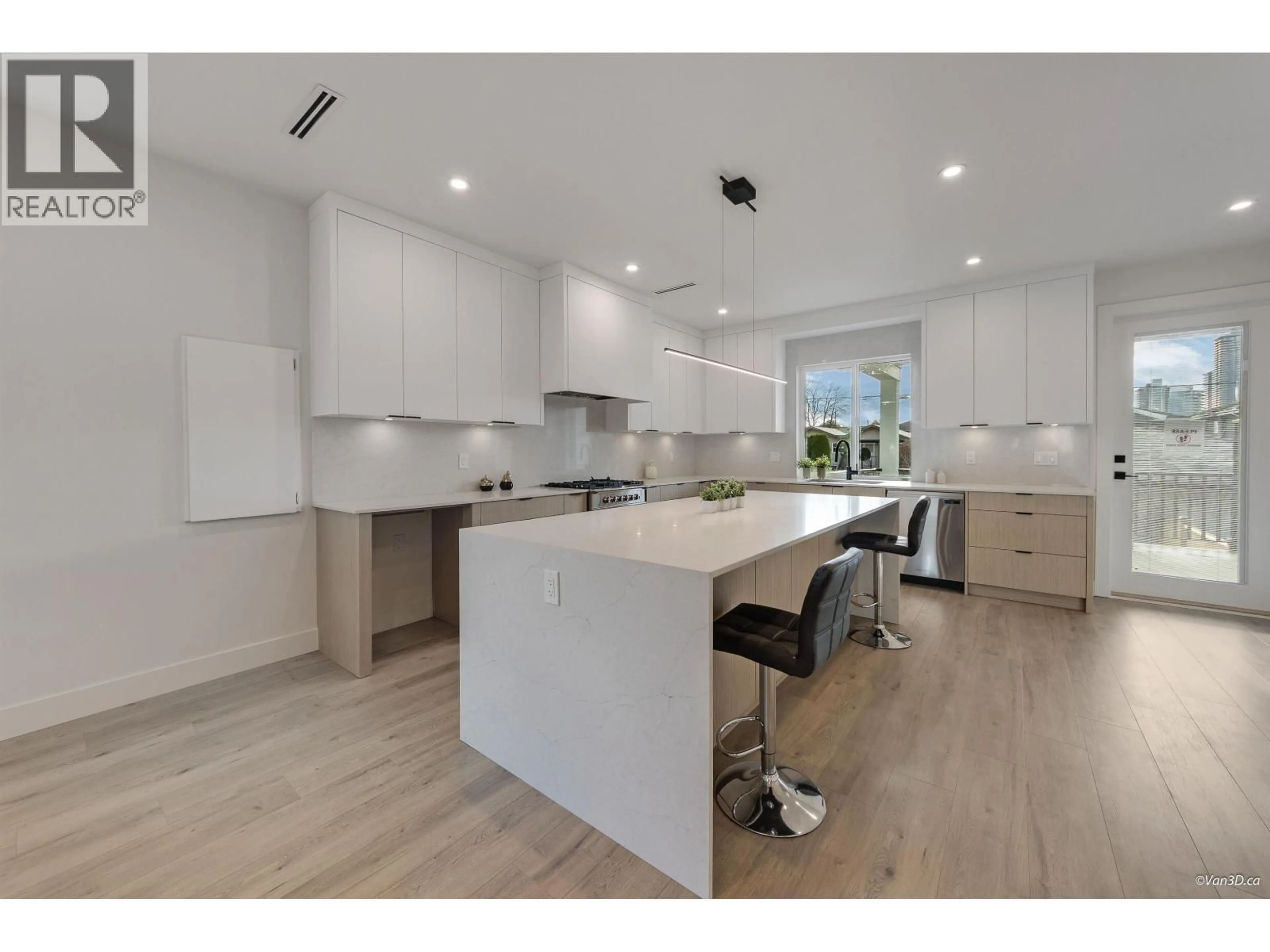 Open concept kitchen, wood/laminate floor for 1 - 7893 2ND STREET, Burnaby British Columbia V3N0K2