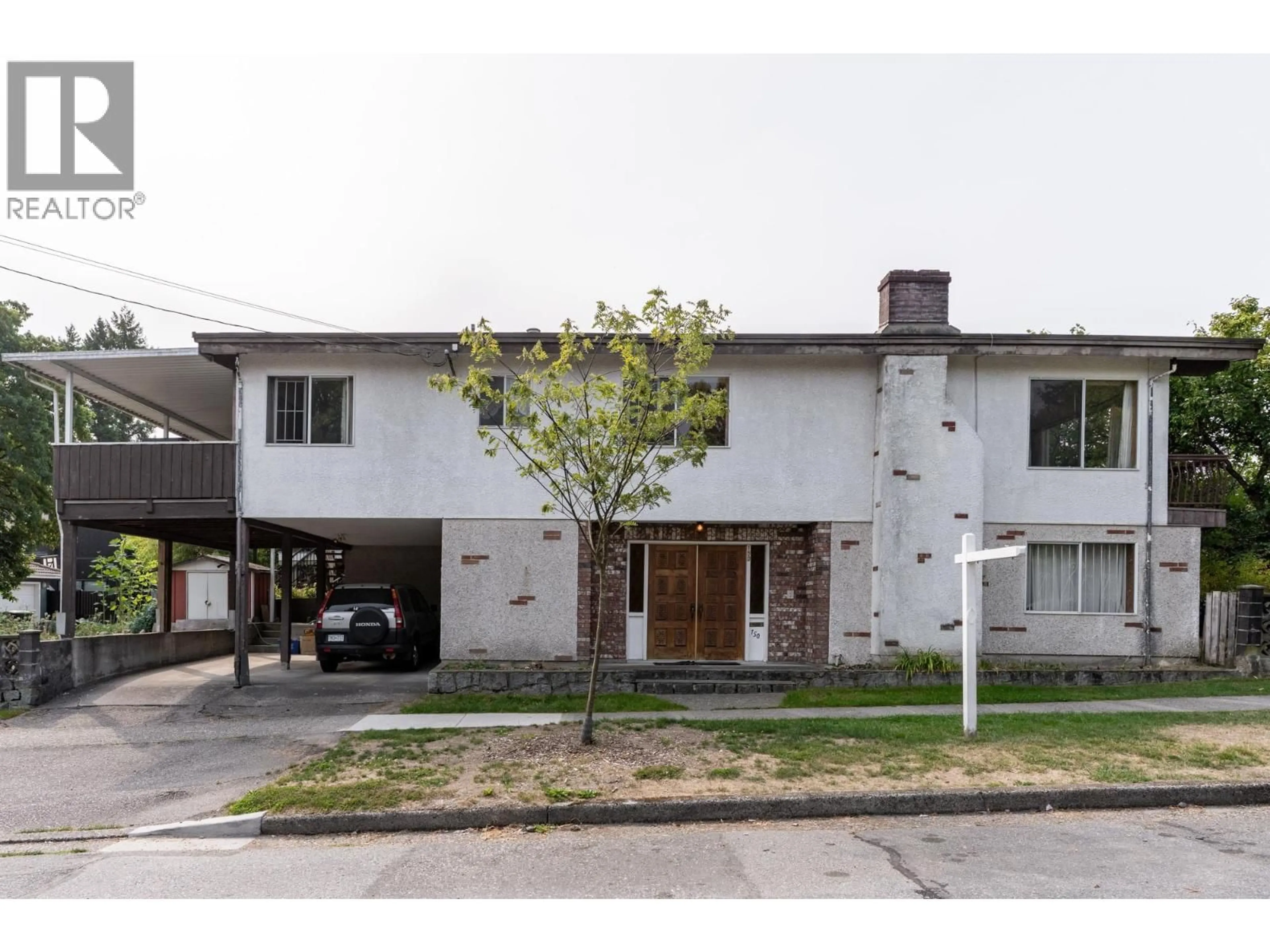 Home with brick exterior material, street for 150 28 AVENUE, Vancouver British Columbia V5V2M2