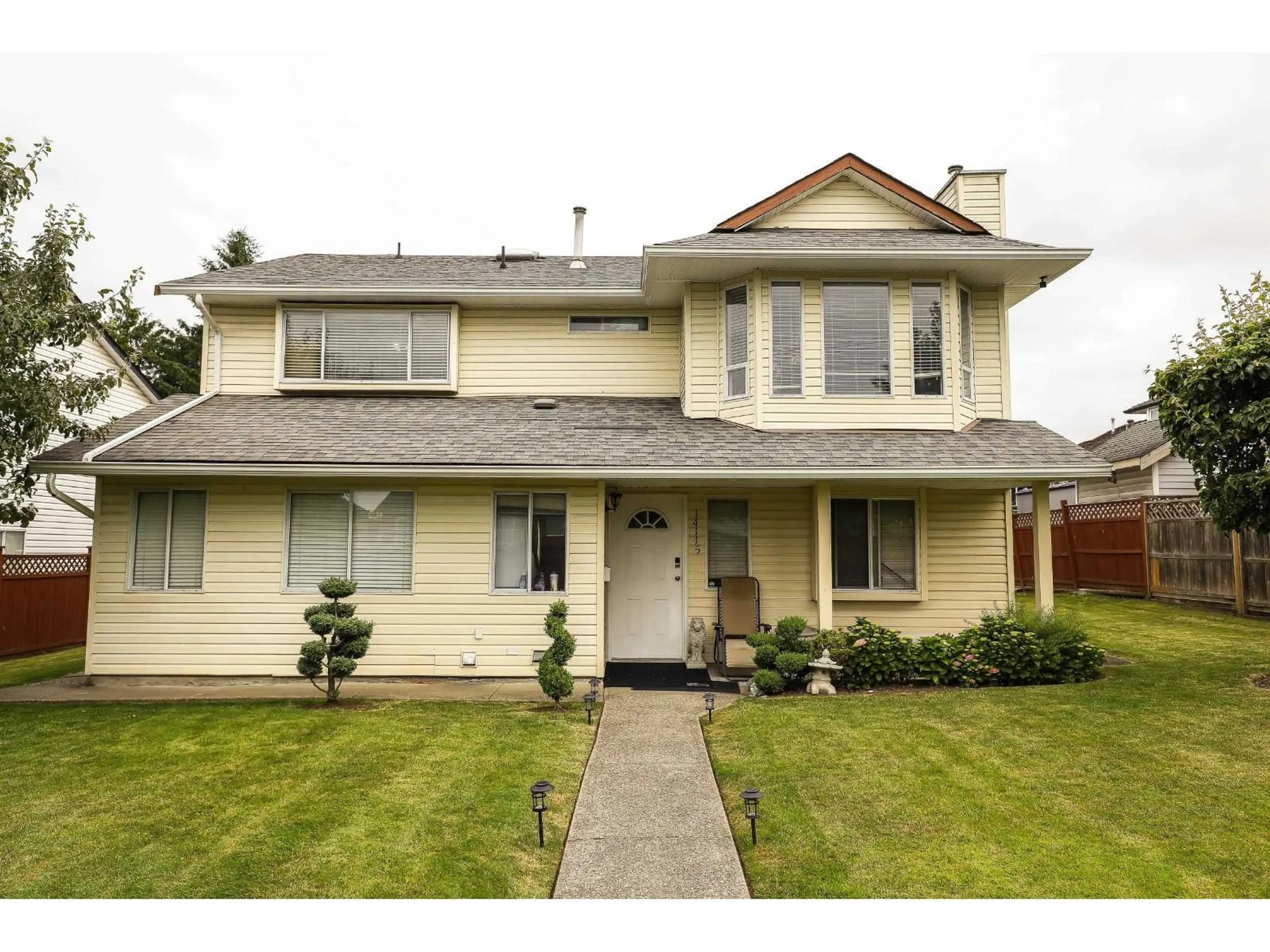 Home with vinyl exterior material, street for 14115 88TH, Surrey British Columbia V3W3L5