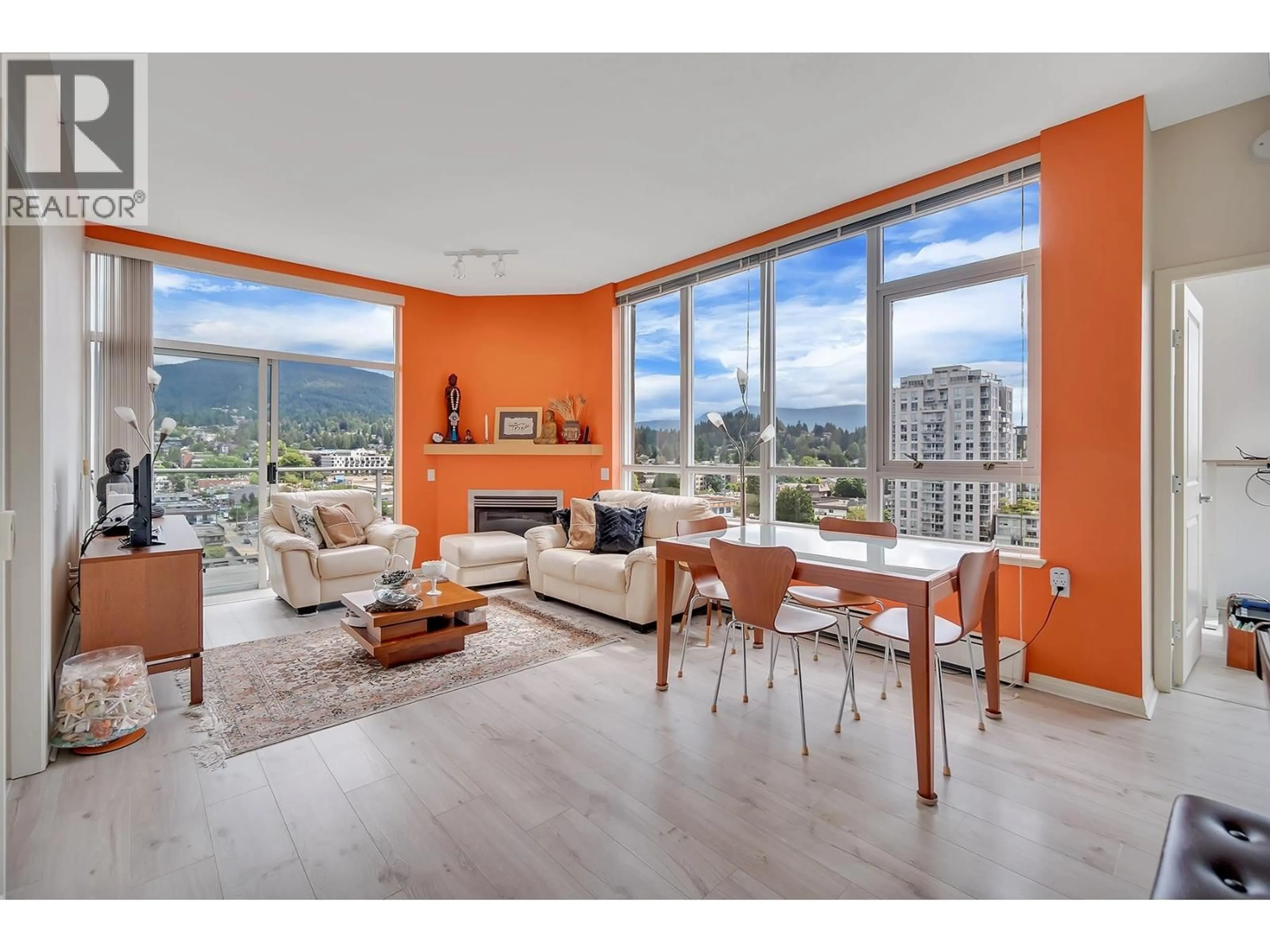 Living room with furniture, wood/laminate floor for 1403 - 120 16TH STREET, North Vancouver British Columbia V7M3N6